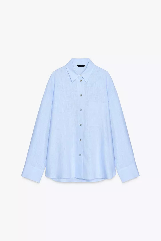 Loose-fitting linen shirt. Featuring a revere collar, long sleeves, a front patch pocket, side ve... | Zara US