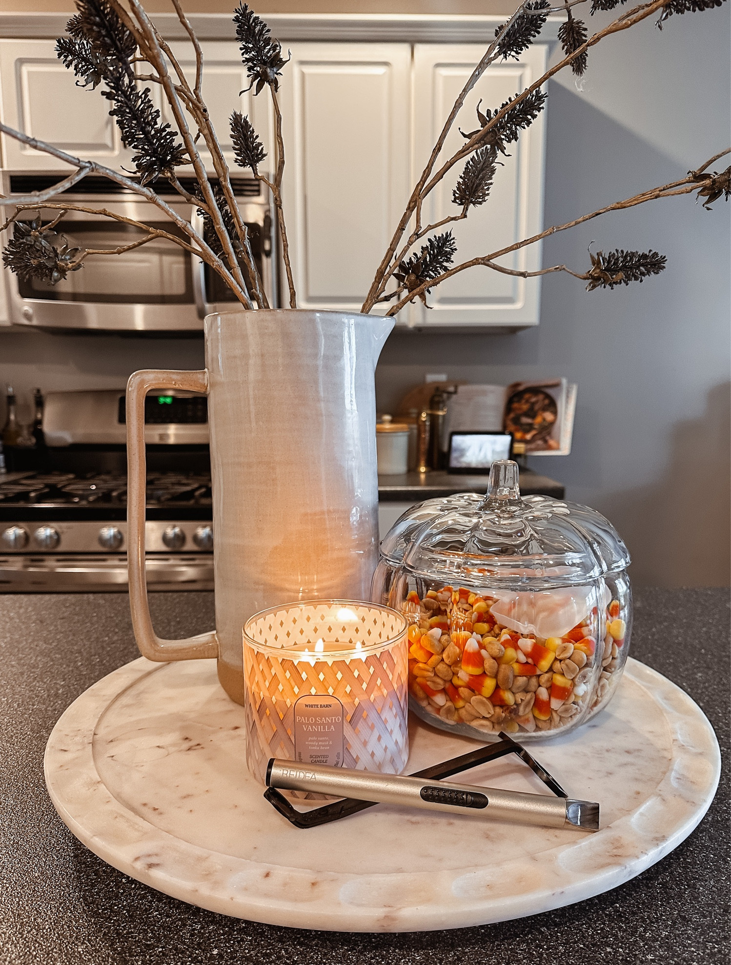 Kitchen decor // kitchen aesthetic // Halloween snack storage // pumpkin jar // lazy Susan // kitchen island decor // seasonal decor 

#LTKHalloween #LTKhome #LTKHoliday