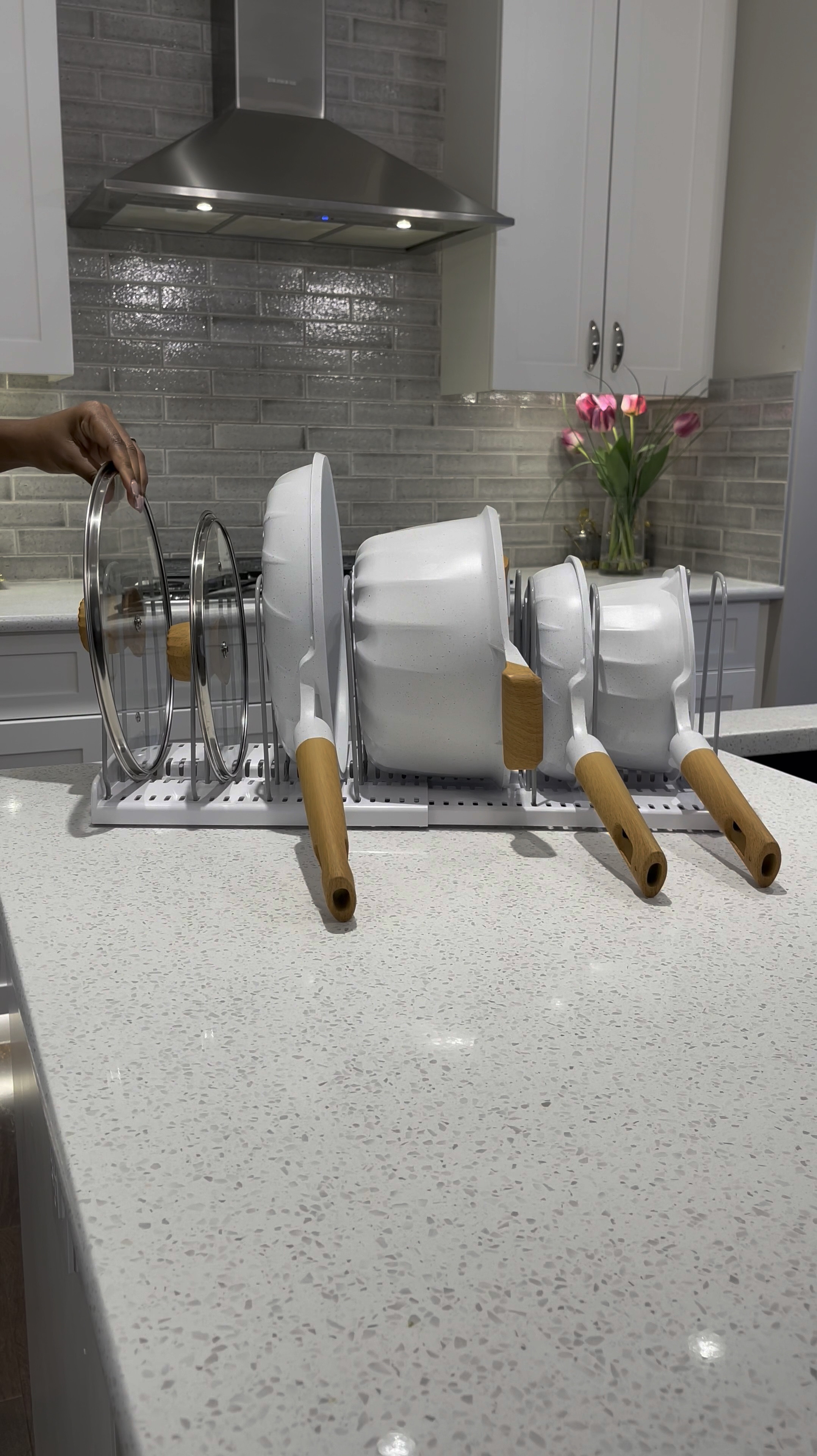 Hey friend! 😊

Organize your kitchen effortlessly with this adjustable organizer. With 10 dividers, it neatly stores your pots, lids, cutting boards, baking pans, and larger containers. Plus, it doubles as a drying rack for your dishes!

#KitchenOrganizer #AdjustableOrganizer #SpaceSaver #HomeEfficiency 

#LTKStyleTip #LTKHome #LTKVideo