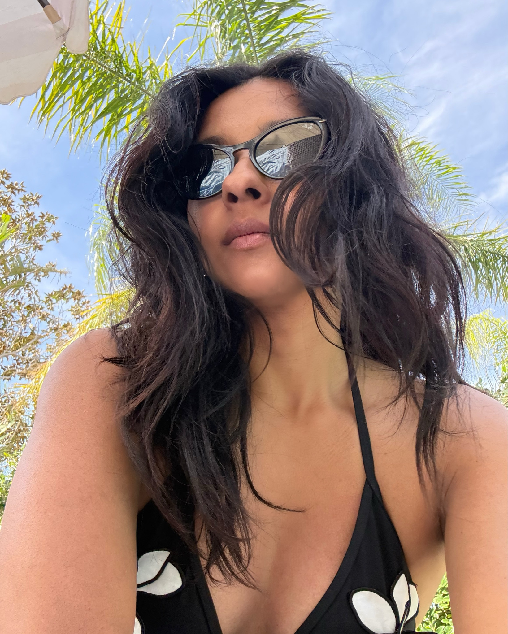 Cat eye sunnies.

#LTKOver40 #LTKSwim #LTKSeasonal