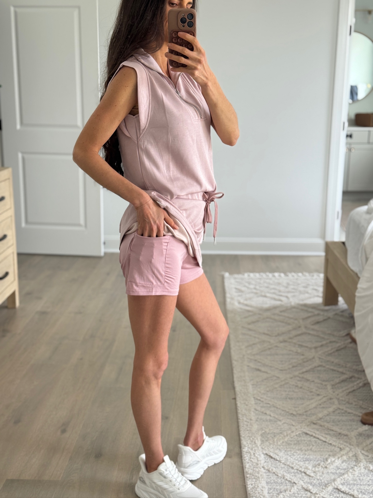 Casual spring outfit with matching set, sleeveless zip top and skirt set, comfy everyday outfit, athleisure outfit idea, mom style, easy throw on outfit, neutral sneakers look

#LTKmomlife #LTKootd #LTKSeasonal