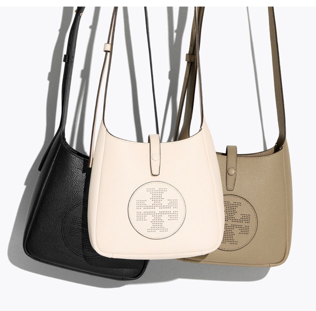 MILLER SWING CROSSBODY BAG

 The Miller Swing Crossbody Bag is designed in soft pebbled leather that is bonded for lightweight structure. Designed with a small interior pocket and finished with a snap closure, it can fit a phone, wallet, earbuds and keys.

#LTKWorkwear #LTKootd #LTKTravel