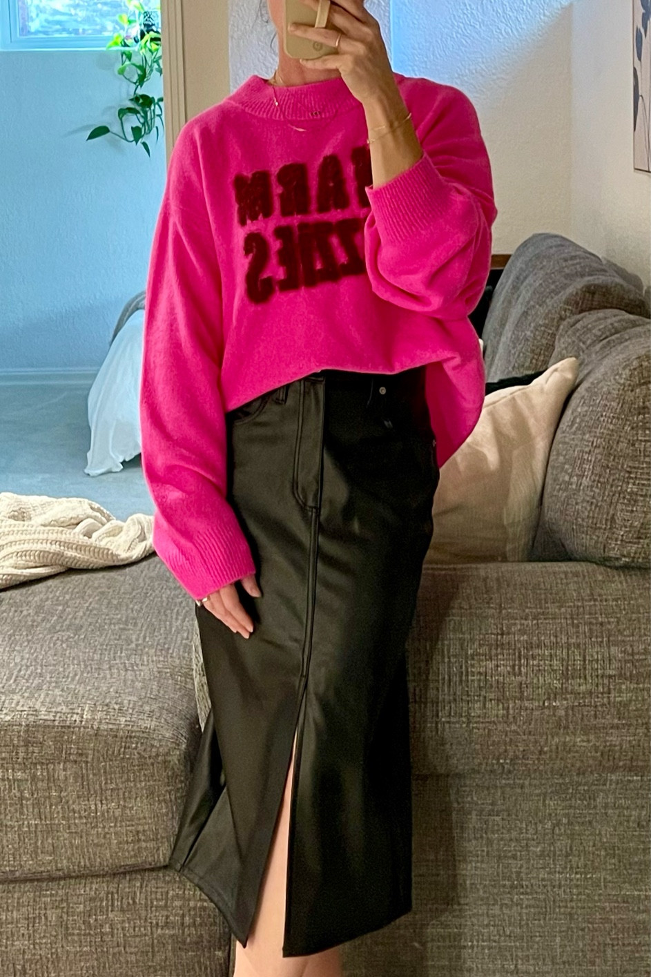 Super impressed with this faux leather midi! Wearing a size 2 but want to try a zero - if you’re in between sizes, I’d size down. 

Also, love love love this sweater - so soft and so fun! Only $17.50 right now! I’m wearing an XL here to be oversized but could have achieved the same look with an L  

#LTKSeasonal #LTKHoliday #LTKfindsunder50