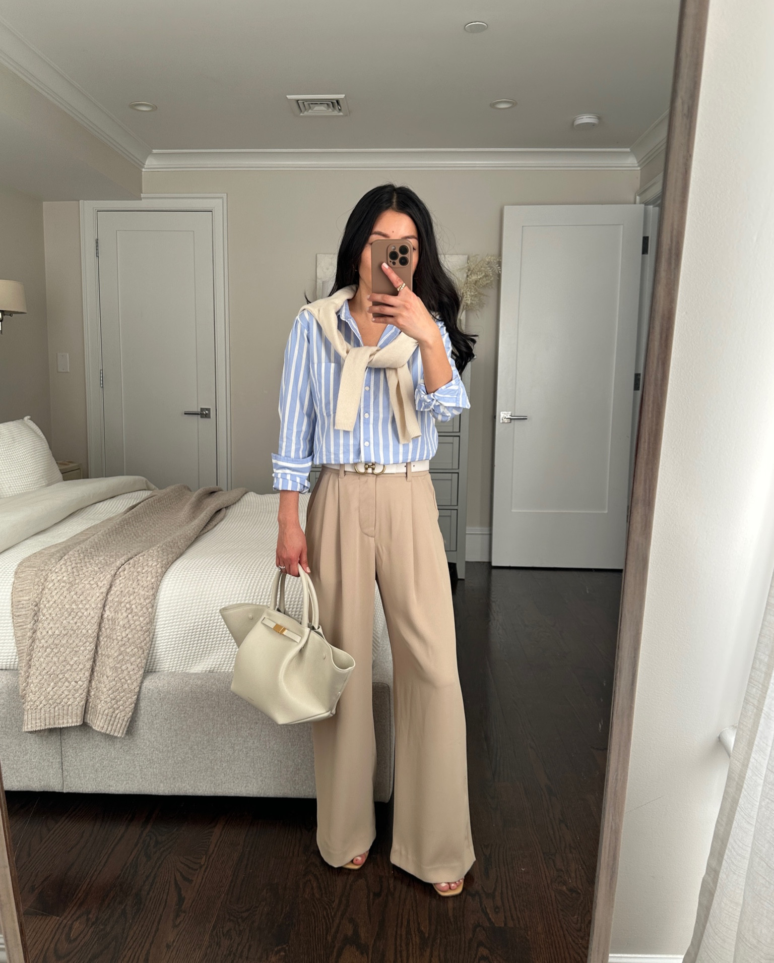 On sale! Wrinkle resistant drapey trouser pants. Classic style however note these do run big

• editedpieces.com reversible belt xxs 

• High rise pleated trousers in tan 00 petite - these fit roomy on me, which is typical for Gap sizing 

00P measures 13" across the waist with stretch elastic back waistband, 11" rise, 27.5" inseam. looser fit through the hips and leg. I am 5 feet tall and wear these with a 2/2.5” heel. 

• Gap striped organic cotton shirt xxs petite true to size - Sizing are running low for the stripes so I linked a similar option too

• Demellier bag in cream 

Petite business casual classic work wear

#LTKSaleAlert #LTKWorkwear

#LTKworkwear #LTKfindsunder100