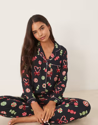 Chelsea Peers poly long sleeve revere pyjama set in Christmas candy print | ASOS (Global)