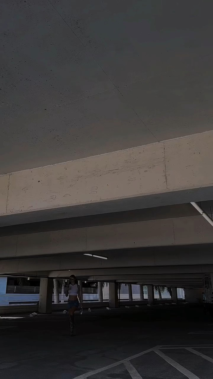 denim mini skirt look with bedazzled knee high boots and basic white tank 🖤

#LTKVideo #LTKstyletip #LTKshoecrush