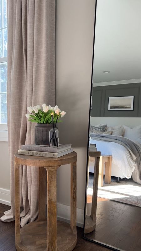 Spring neutral primary bedroom. Cherry blossoms and tulips keep the space bright for spring and layered bedding creates a calming space. 

#LTKhome #LTKstyletip #LTKSeasonal