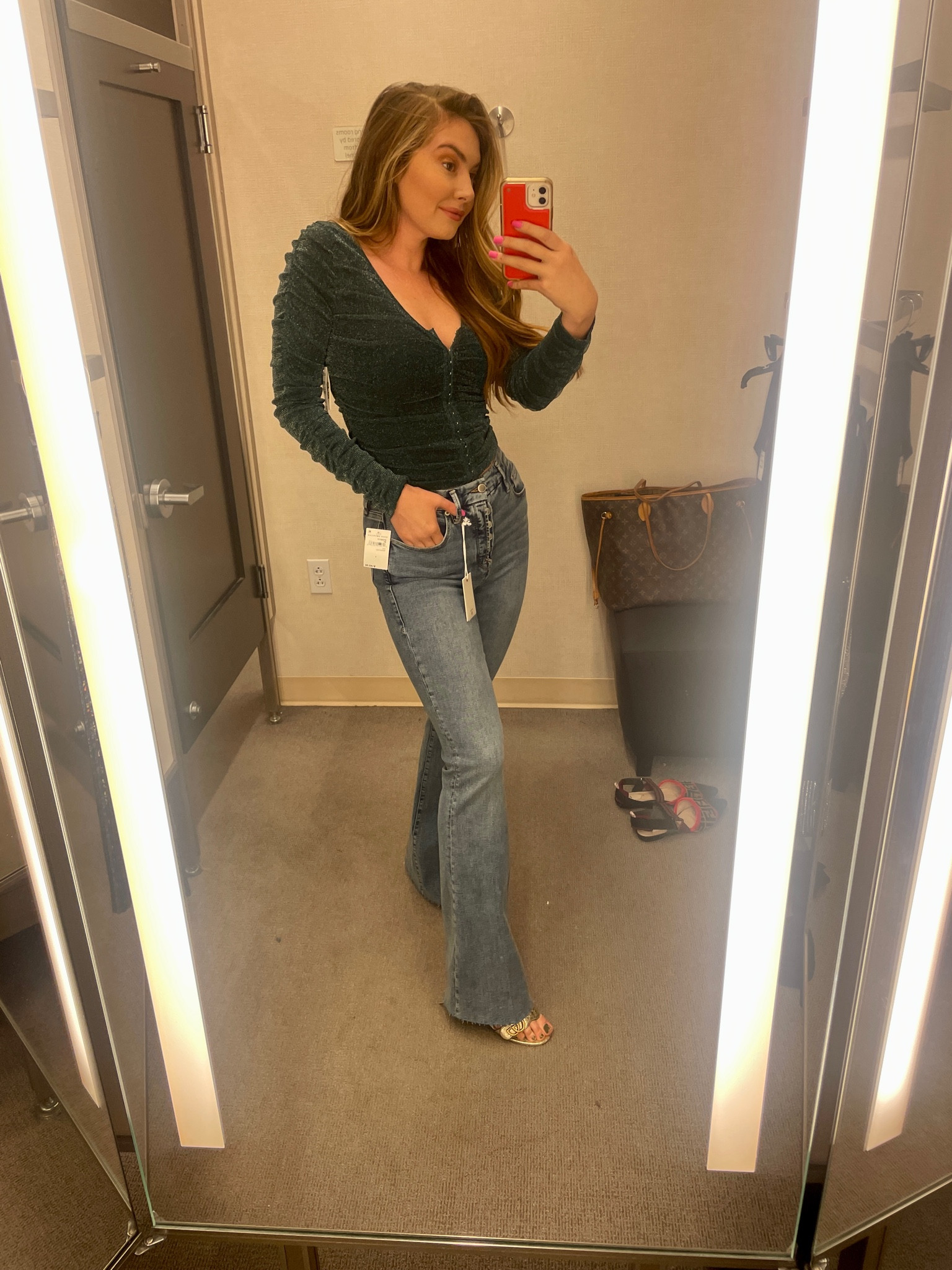 Shop New Year’s Eve looks at Nordstrom with me! Love this green ruched sparkly top with the Good American flare jeans and Gucci marmont heels (perfect height) for a more casual NYE or holiday party. Top is a size XS. Jeans are a size 4 (SO comfy & love the buttons).

#LTKstyletip #LTKunder50 #LTKHoliday