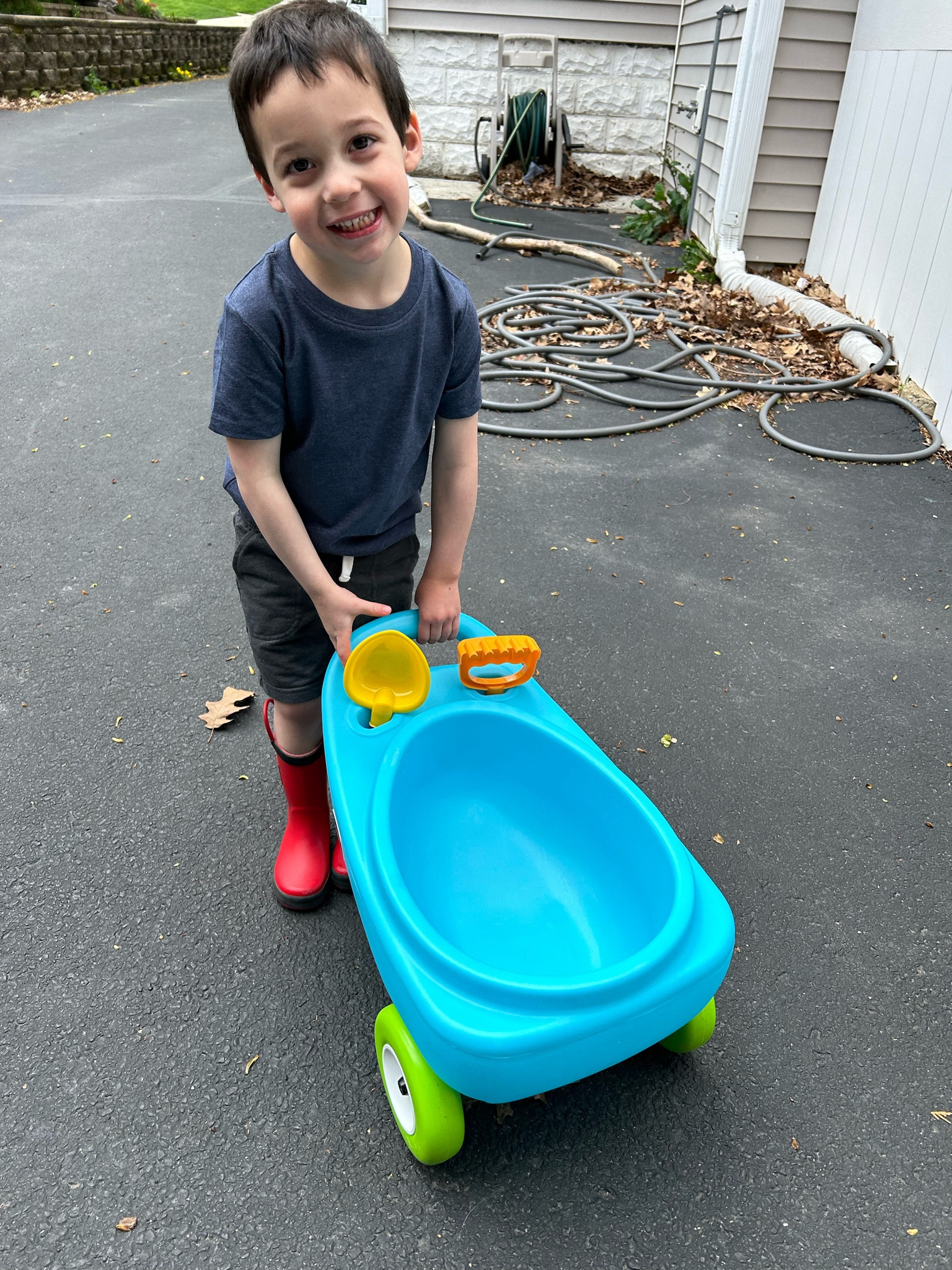The cutest outdoor toy for toddlers to help with yard work outside all Spring and Summer long. This adorable wheelbarrow comes with a shovel and rake. Perfect for littles! Can be used inside for collecting toys too. 

#LTKSeasonal #LTKkids