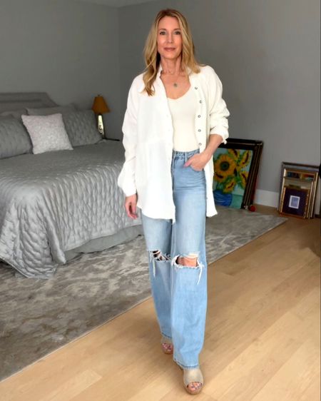 Summer casual outfit
White shirt blouse cover-up
Sweater tank
Wide leg jeans

#LTKSeasonal