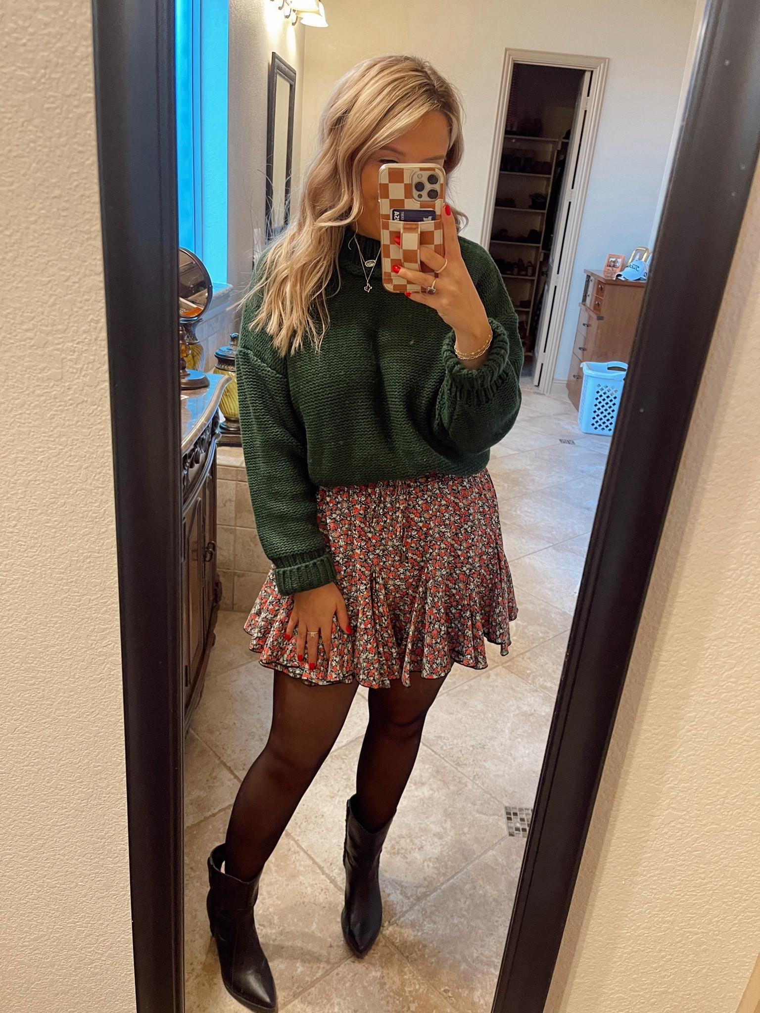Amazon chunky sweater
Floral skort 
Sheer black tights 
Dolce Vita cowgirl booties 

#LTKfindsunder100 #LTKstyletip #LTKshoecrush