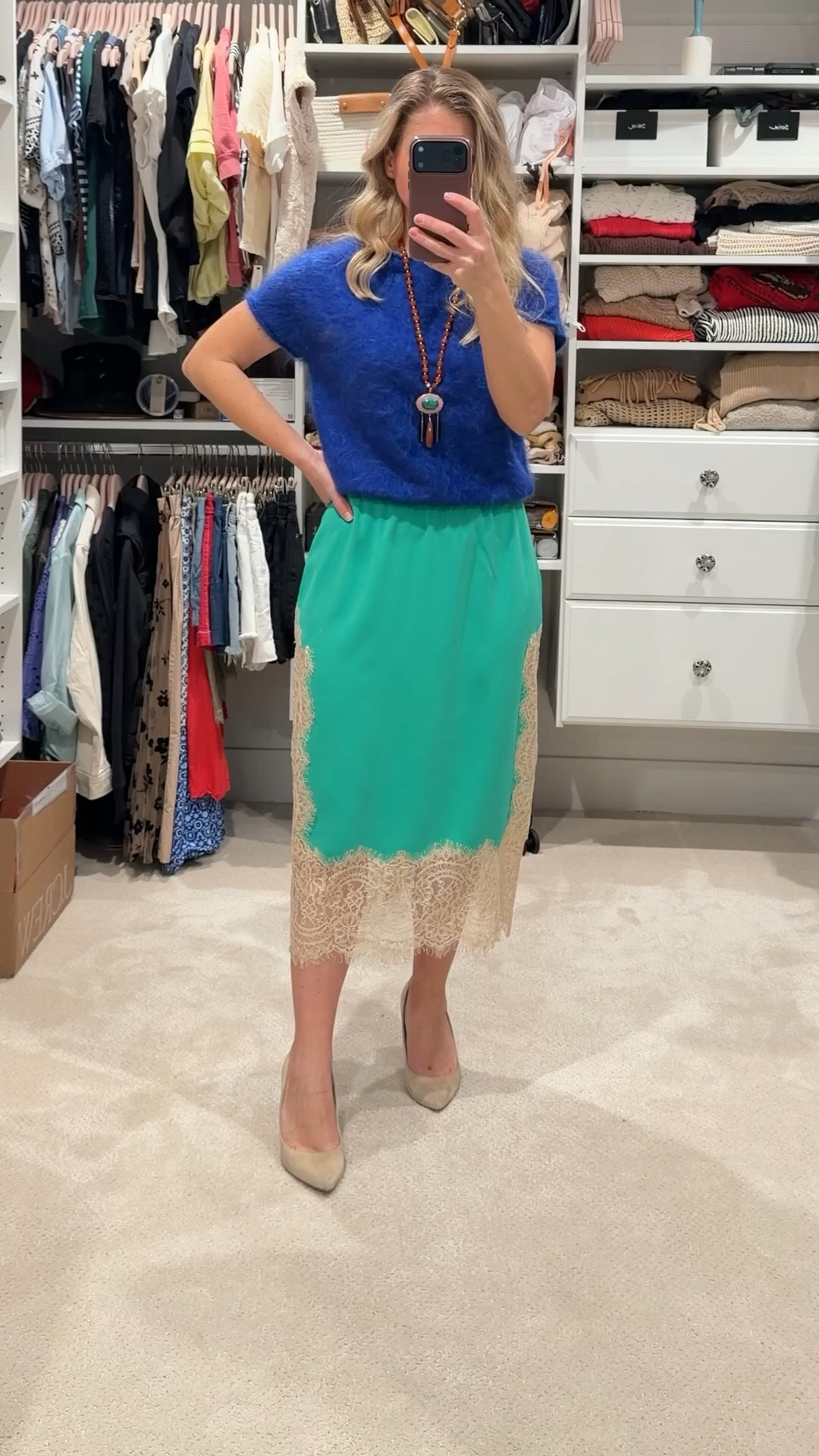 Choosing the right colors for your skin tone can make such a difference in how an outfit comes together. This rich blue paired with emerald green is one of my favorite combinations because it adds color while still feeling polished and elevated.

I love pieces like this satin midi skirt because they can easily transition through the day. This look works just as well for the office as it does for date night or drinks with friends.

When you find colors that complement your skin tone, getting dressed becomes a lot easier and a lot more fun. Everything is linked in LTK. ✨

#LTKgrwm #LTKootd #LTKPetite
