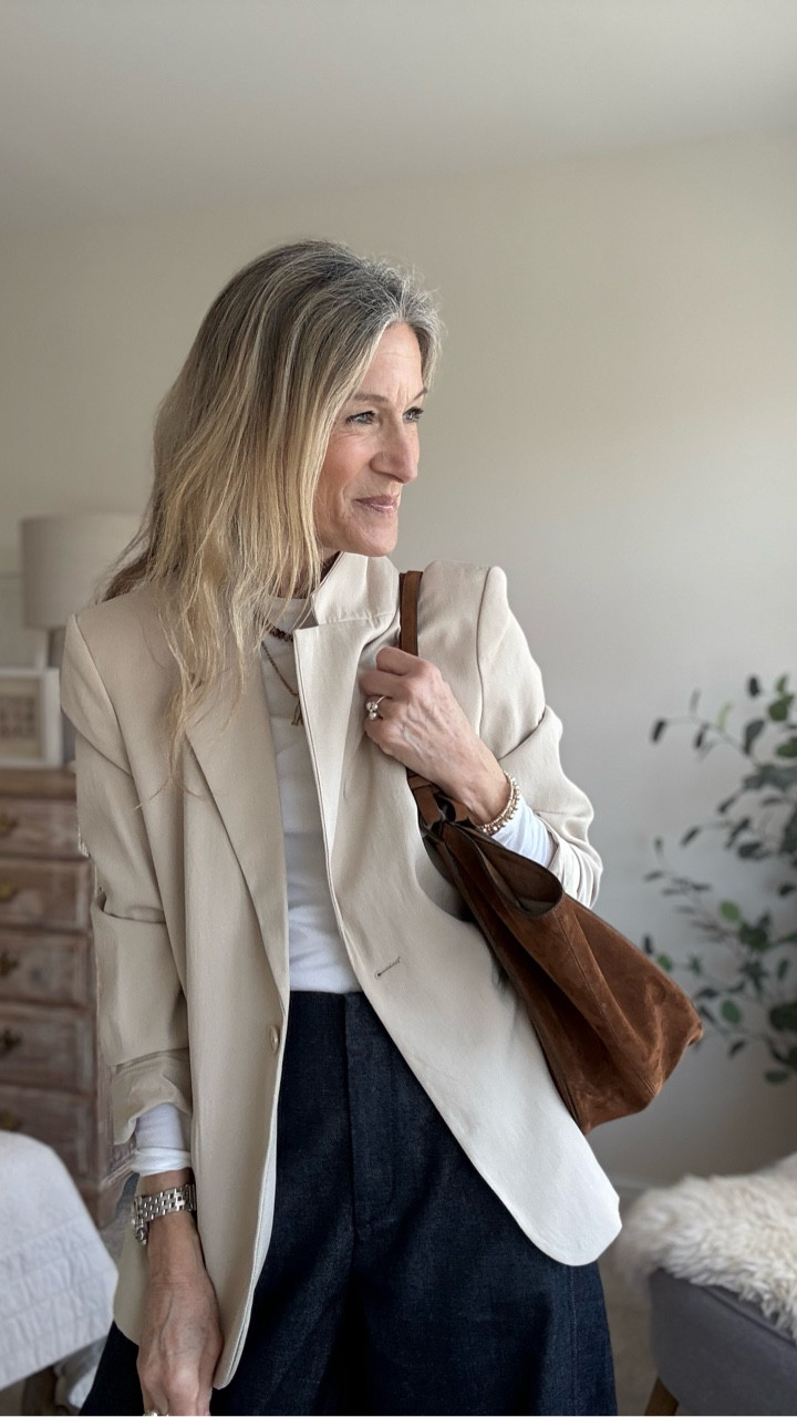 Lighter layers for early Spring. 
Barrel leg trousers 
Neutral Blazer 
Suede Tote 
White Tee 
Ballet Flats

#LTKover50style #LTKspring #LTKuk