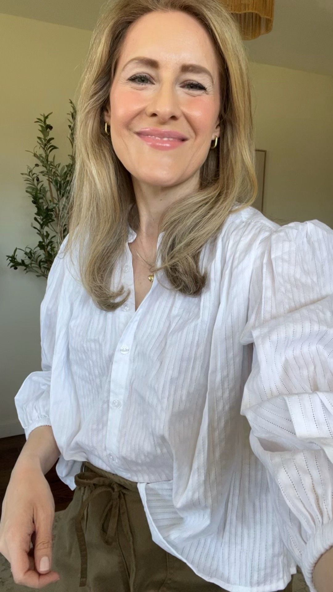 Here’s a pretty spring outfit idea from Walmart with their new paperbag waist shorts and a white long sleeve cotton blouse. Wearing medium in both (shorts run small, I went up one size). #walmartfashion 

#LTKOver40