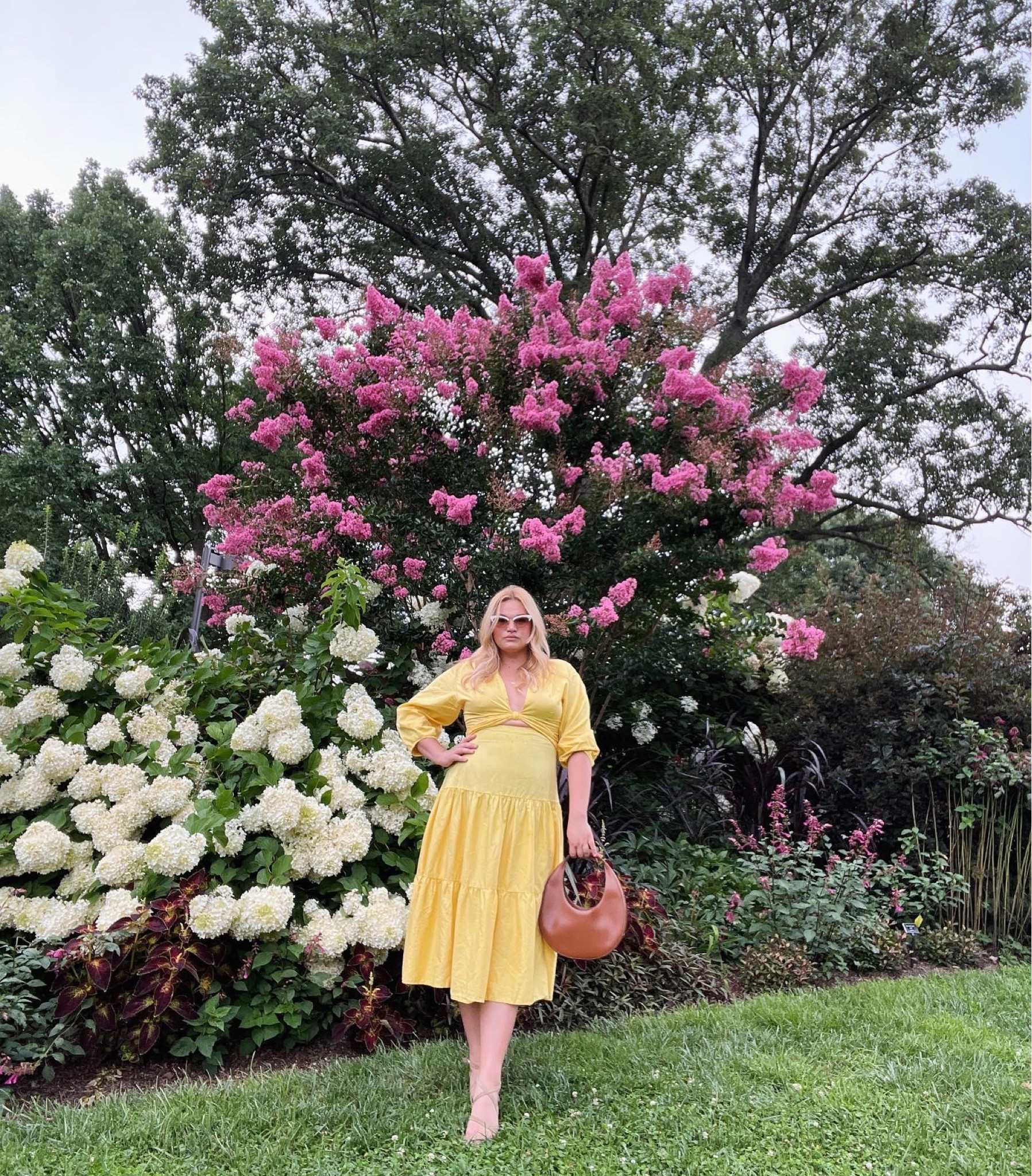 Taking in the last bit of summer in this bright, yellow #dereklam midi dress.  I paired it with my favorite moon bag from #staud.  My style tip for wearing bright colors - pair it with neutral accessories like nude sandals / a brown bag. 

#LTKmidsize #LTKcurves #LTKstyletip