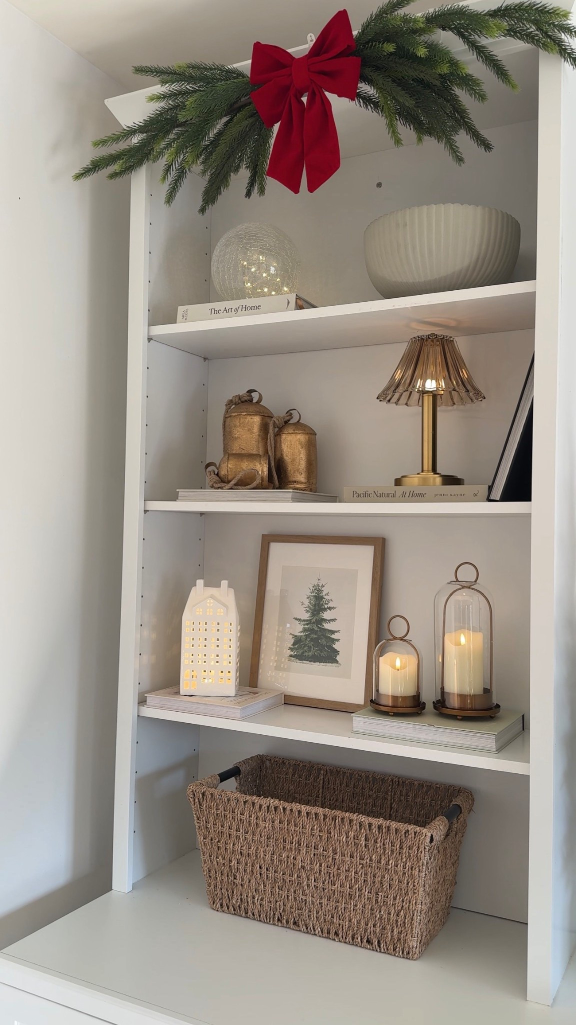 Christmas shelf decor! I made the swag with 3 of the pine stems and secured them with zip ties 


#LTKHoliday #LTKHome