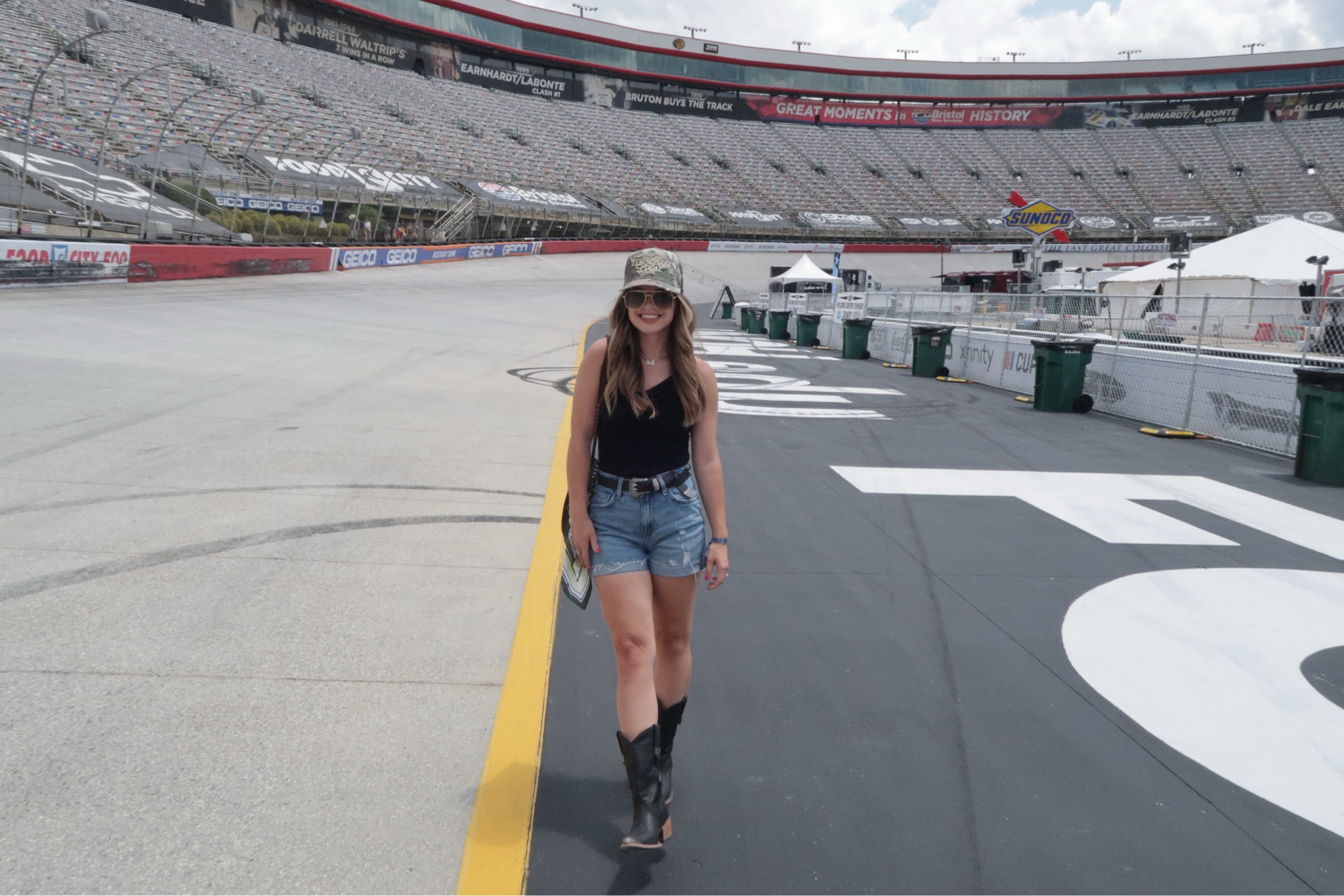 Country thunder outfit idea country concert outfit 🖤 I cuffed my wrangler shorts. Bag is Alamo saddlery not on LTK 🫶🏼

#LTKShoeCrush #LTKTravel #LTKStyleTip
