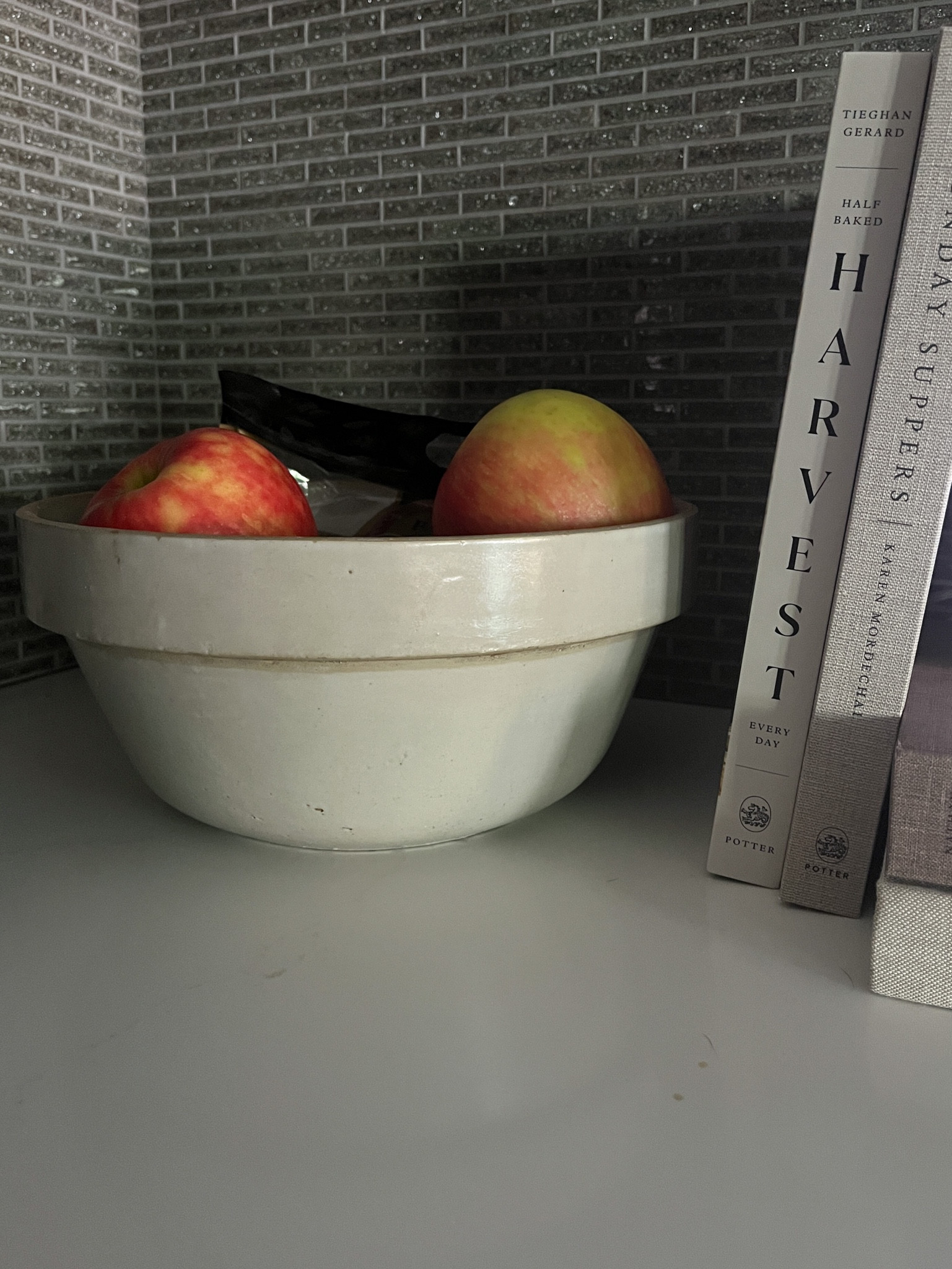 Vintage crock bowl as a fruit bowl 
Kitchen decor
Cookbooks 

#LTKhome #LTKstyletip #LTKfindsunder100