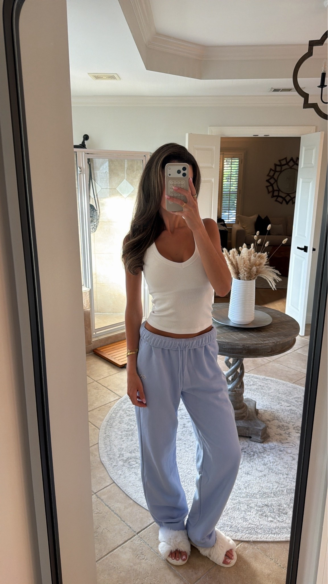 Love these bra free tanks from Abercrombie! They have a built in bra! I wear a small. Also, wearing a small in these comfy alo sweatpants.

#LTKootd