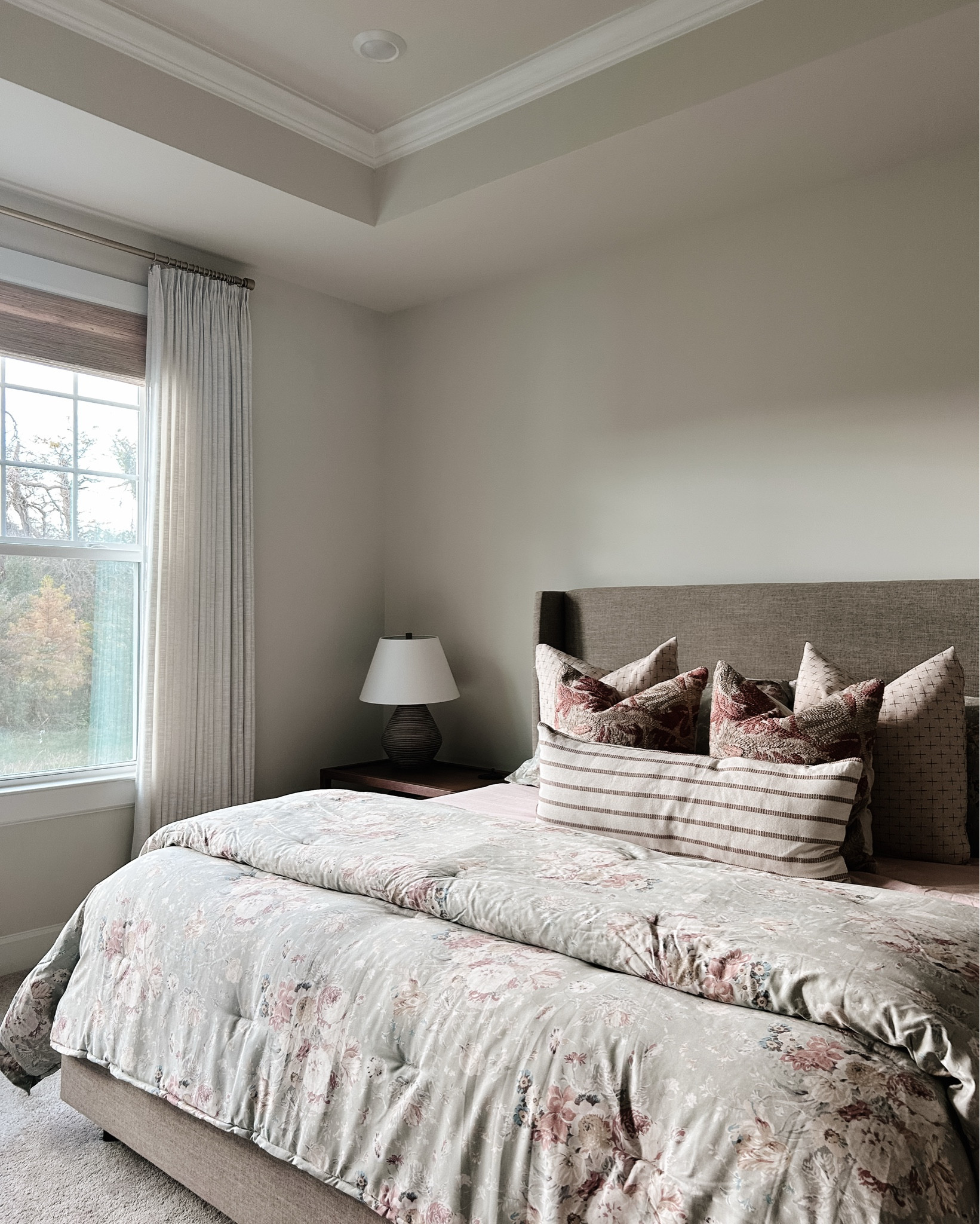 ’m completely obsessed with my new Ralph Lauren floral bedding — the perfect blend of timeless, traditional charm and elevated elegance. The soft muted tones add warmth and character without feeling too bold. I paired it with Naturepedic organic percale sheets, which are unbelievably crisp, breathable, and made from 100% GOTS-certified organic cotton — total luxury meets clean living 🌿

To finish the look, I added pinch pleat curtains for that classic, tailored feel and motorized woven wood shades that bring texture, natural warmth, and convenience at the touch of a button.

🛏️ Cozy, organic, and sophisticated — exactly the vibe I wanted for this space.

#LTKFindsUnder100 #LTKU #LTKHome