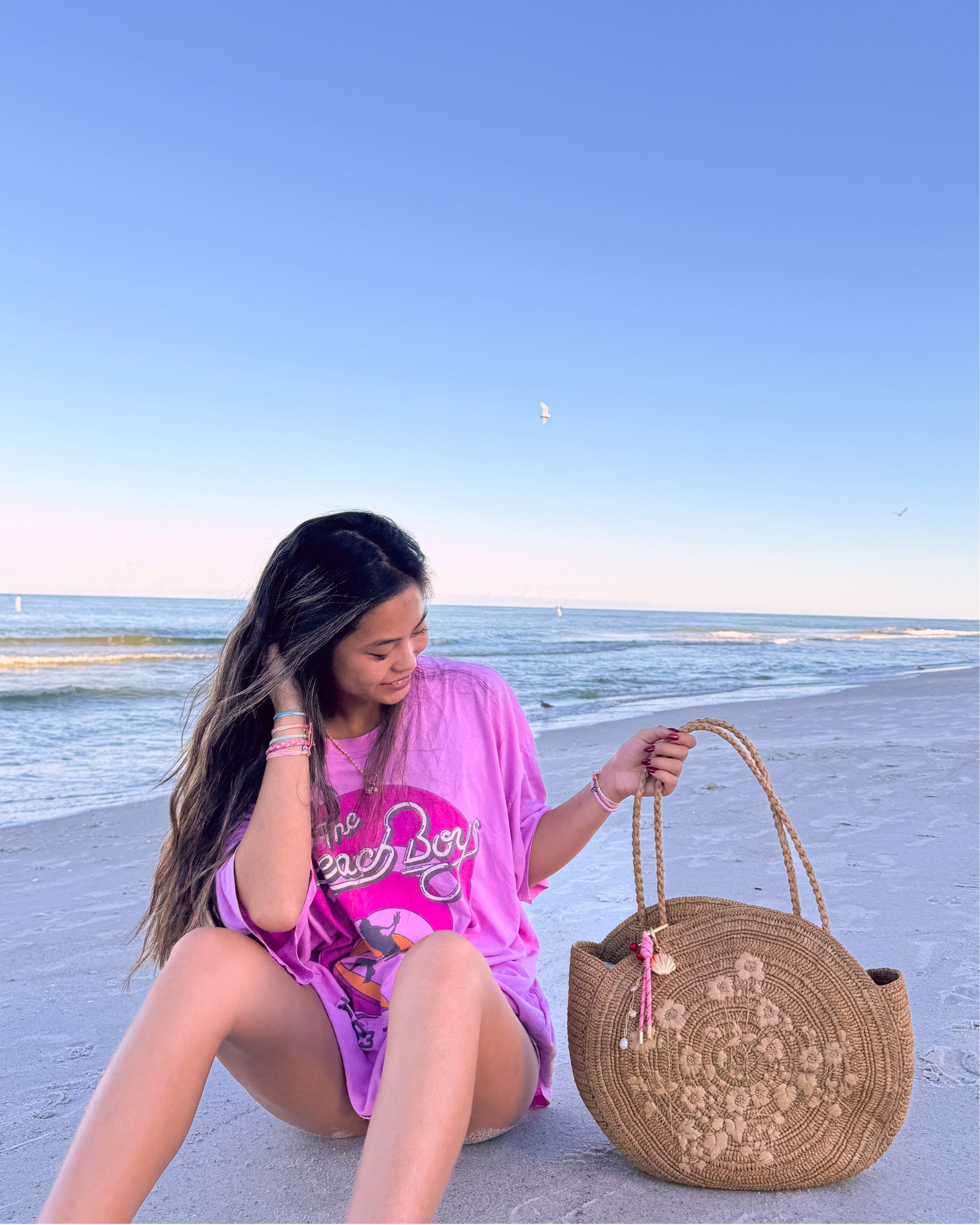 beach outfit inspo, sezane straw bag, tote bag, bag charms, puravida bracelets, friendship bracelets, beach boys band tee, beach ootd, tropical style, vsco girl aesthetic, colorful jewelry, florida girl outfits, waterproof jewelryy

#LTKSaleAlert #LTKU #LTKTravel