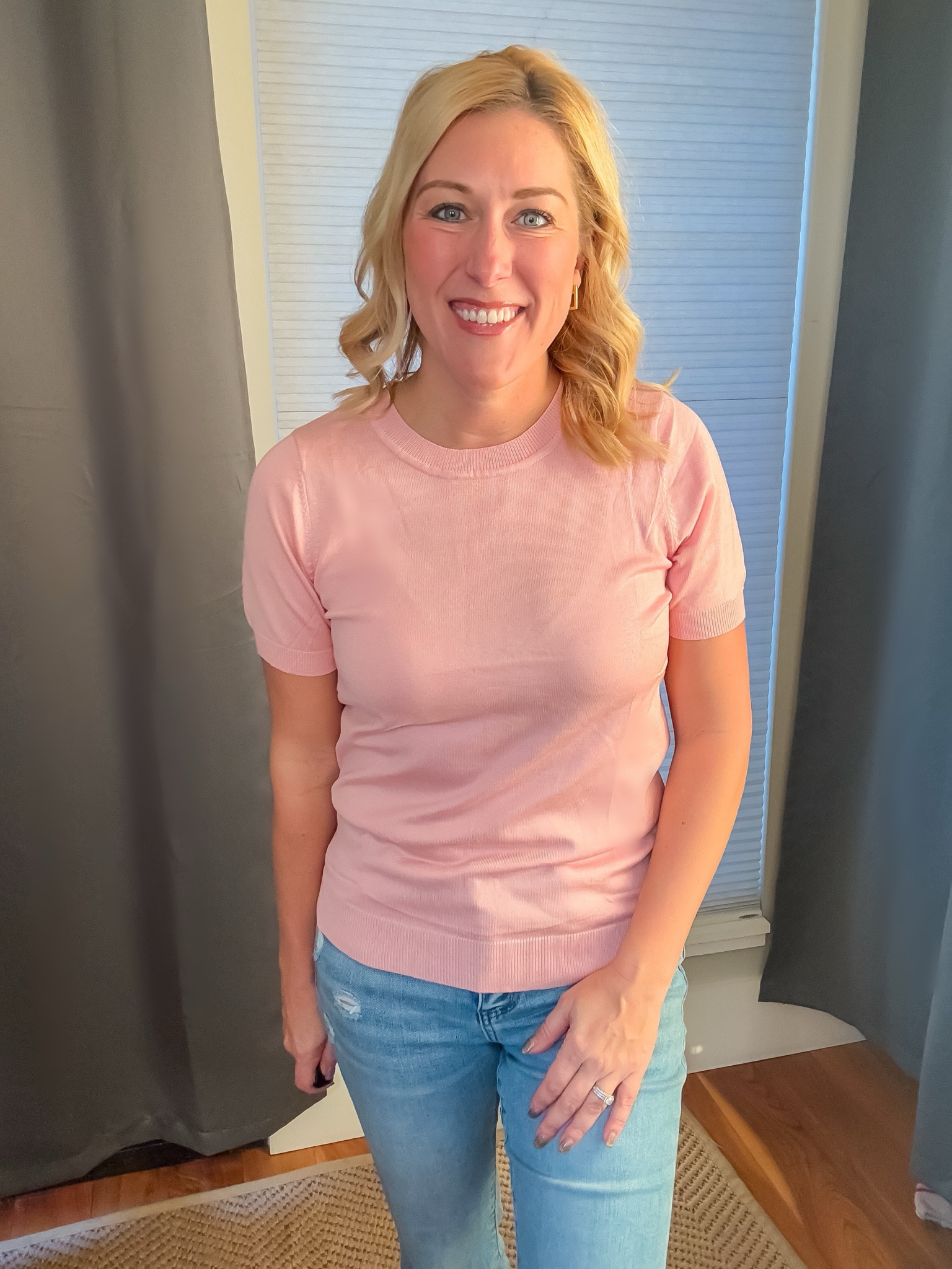 This short sleeve sweater is perfection and I just love this shade of pink! Pair this with jeans and sneakers or dress it up with some pants and heels for work!