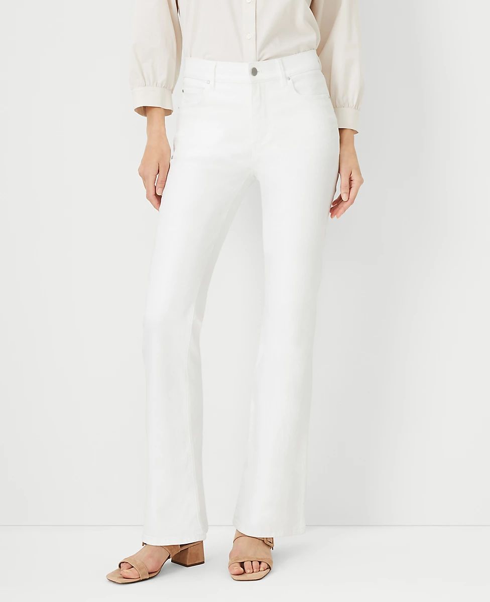 Petite Curvy Sculpting Pocket Mid Rise Slim Boot Cut Jeans in White | Ann Taylor (US)