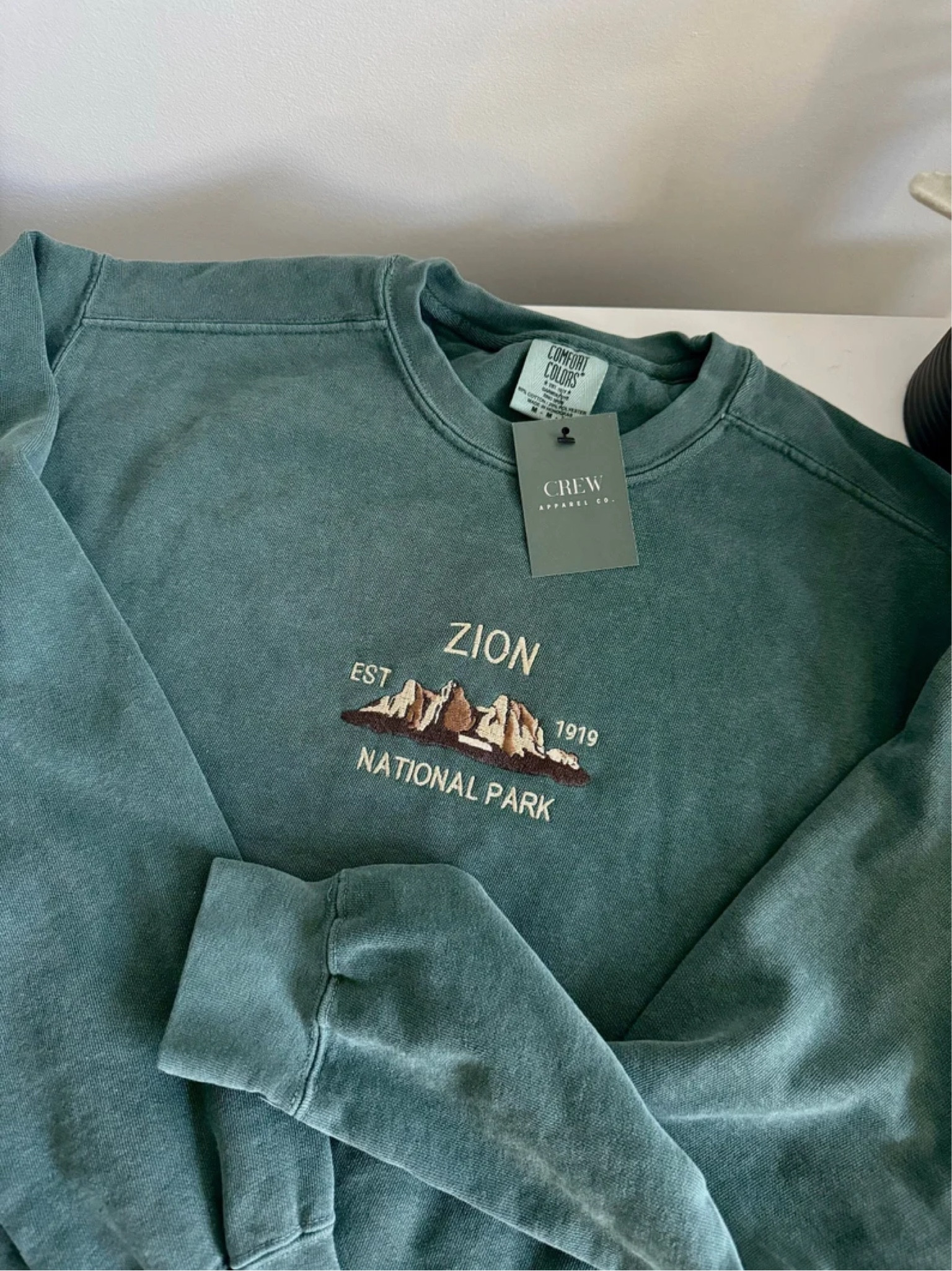 On sale now!! Sweater is linked. Zion National Park Embroidered Sweatshirt | High Quality | Crewneck | Unisex | Travel | Embroidery | National Parks

#LTKsummer #LTKtravel #LTKstyletip
