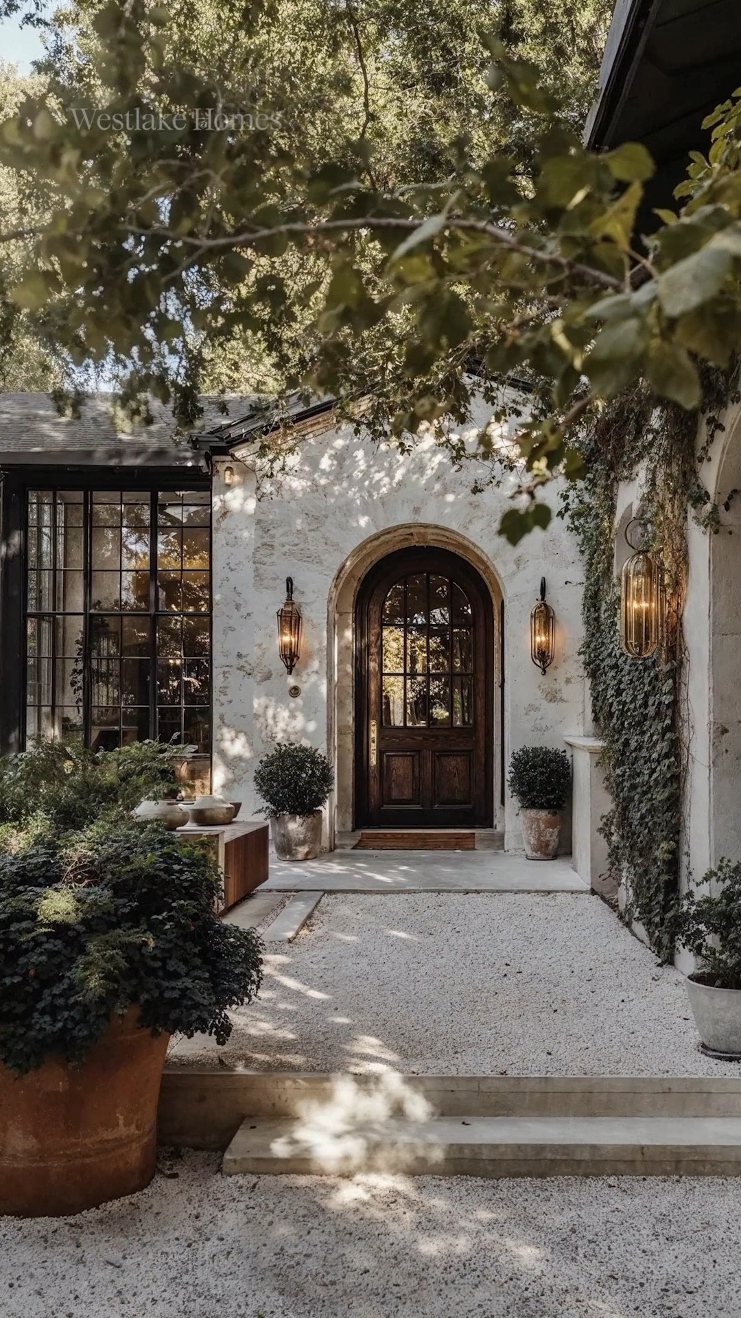A timeless and sophisticated European-inspired home with rustic charm and refined details. From the stone-clad exterior to the grand staircase and warm, inviting interiors, every space feels curated yet lived-in. 

#LTKStyleTip #LTKHome #LTKWatchNow