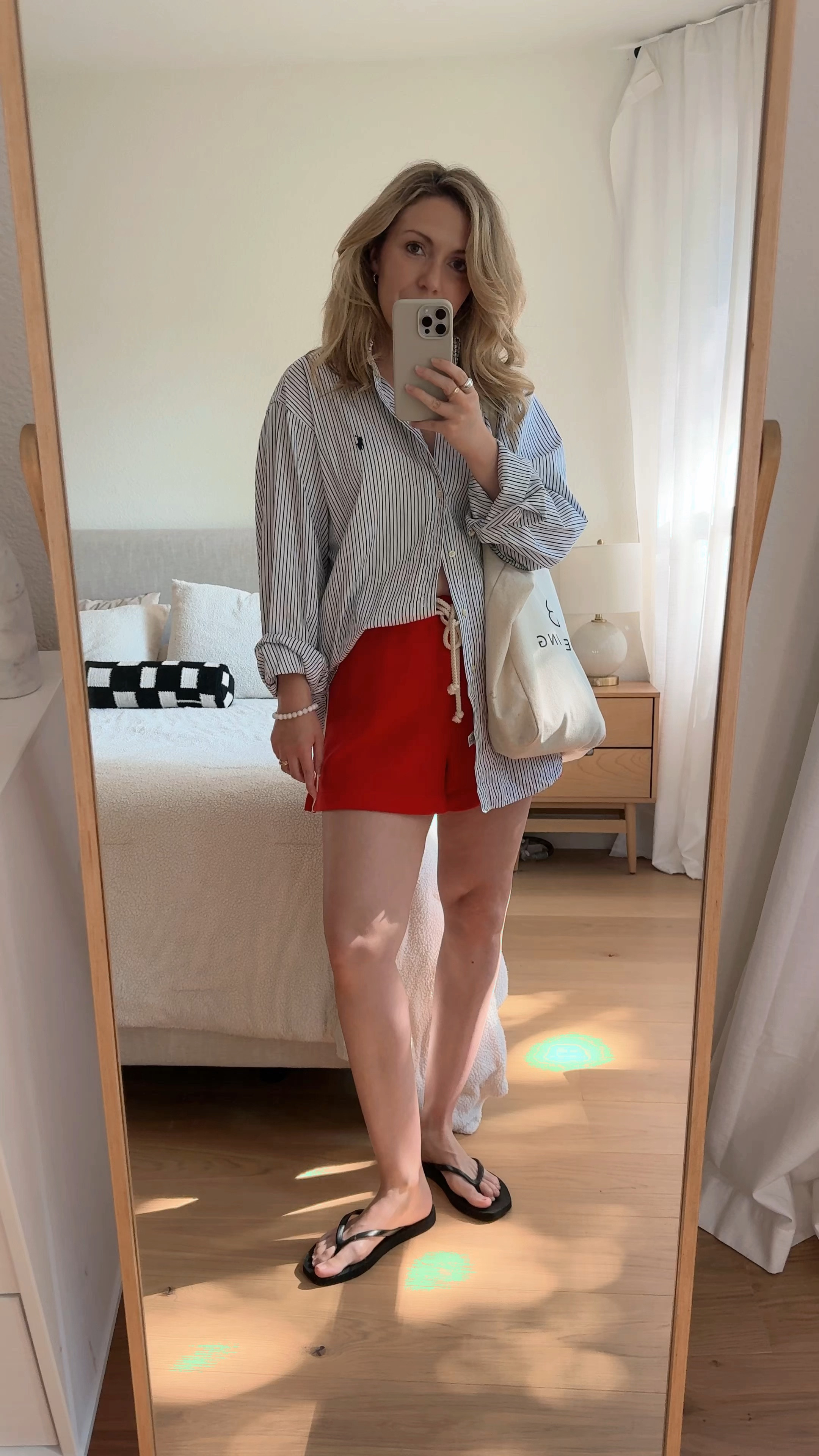 my idea of a perfect Fourth of July outfit❤️🤍💙 an oversized button down that can double as a swimsuit cover + an easy short + flip flops. Add a tote and your favorite sunnies and your good to go💃🏼

#LTKVideo #LTKSeasonal #LTKStyleTip