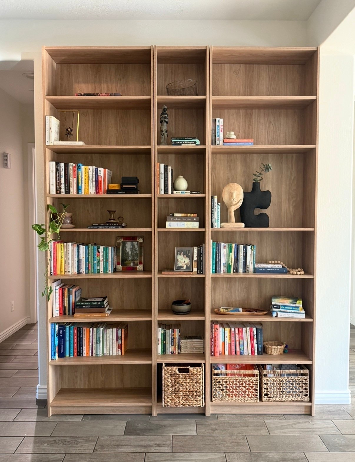 We love the Billy Bookcase. We added two extra additions to the top for extra high ceilings! 