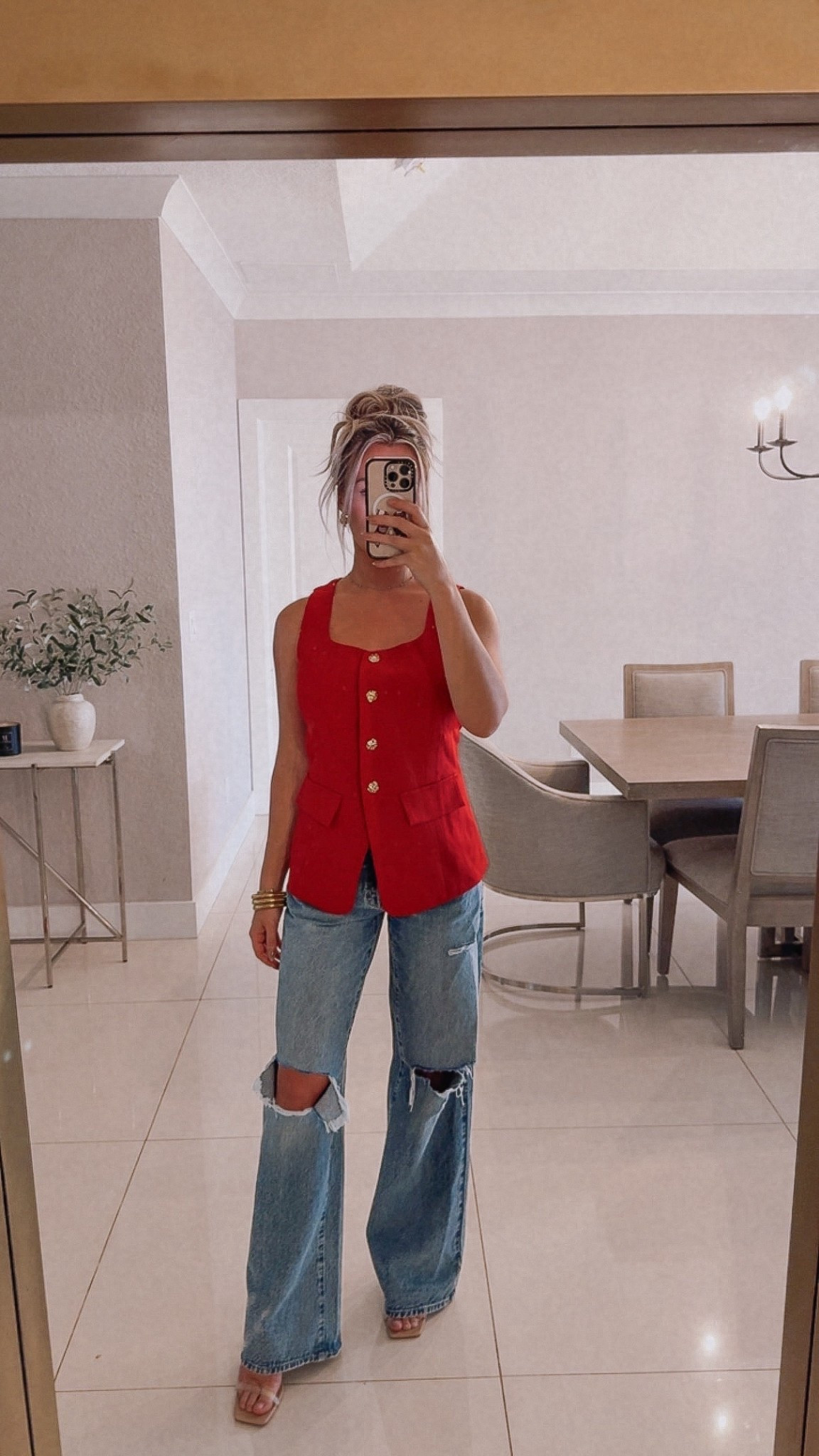 Such a good holiday casual outfit idea. Also great for church, date night, getting together with the in-laws, or a classy girls night out. This red vest is so chic with denim and feels elevated without being dressy — perfect for Thanksgiving or any holiday event where you want to look put together but still comfortable.

Vest: Wearing a small — true to size. Structured, flattering, and easy to layer or wear on its own.

Jeans: Same pair as before. Run large. I’m in a 23 for the relaxed, low-rise, semi-baggy fit.

Heels: Linking my favorite nude heels — comfortable height and match everything.

red vest outfit. red holiday outfit. thanksgiving outfit ideas. christmas casual outfit. holiday outfit ideas. holiday vest. wide leg jeans. low rise jeans. baggy jeans. denim outfit. fall fashion. winter fashion. holiday casual. date night outfit. girls night outfit. amazon fashion finds. amazon vest. nude heels outfit. ltk fashion. everyday style. comfy denim. festive outfit.

#LTKHoliday #LTKFindsUnder50 #LTKootd