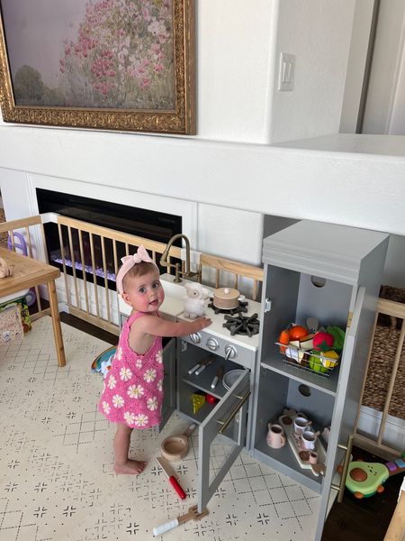 Linked all exact items from tiegans play pen! 👼🏼🤍🍼 outfit is zara / headband is bloom headwraps! 💕 love this play kitchen we got for her birthday she uses it so much & this play pen is the best purchase hands down lol! 

#LTKkids #LTKbaby