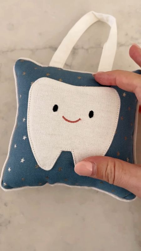 The cutest $5 find!!! This tooth fairy pillow is perfect for kiddos- grabbed it for my son so he can put his tooth on the door ready for pickup! Will make it slightly easier for the tooth fairy to do a swap too! 

#LTKfamily #LTKkids #LTKVideo