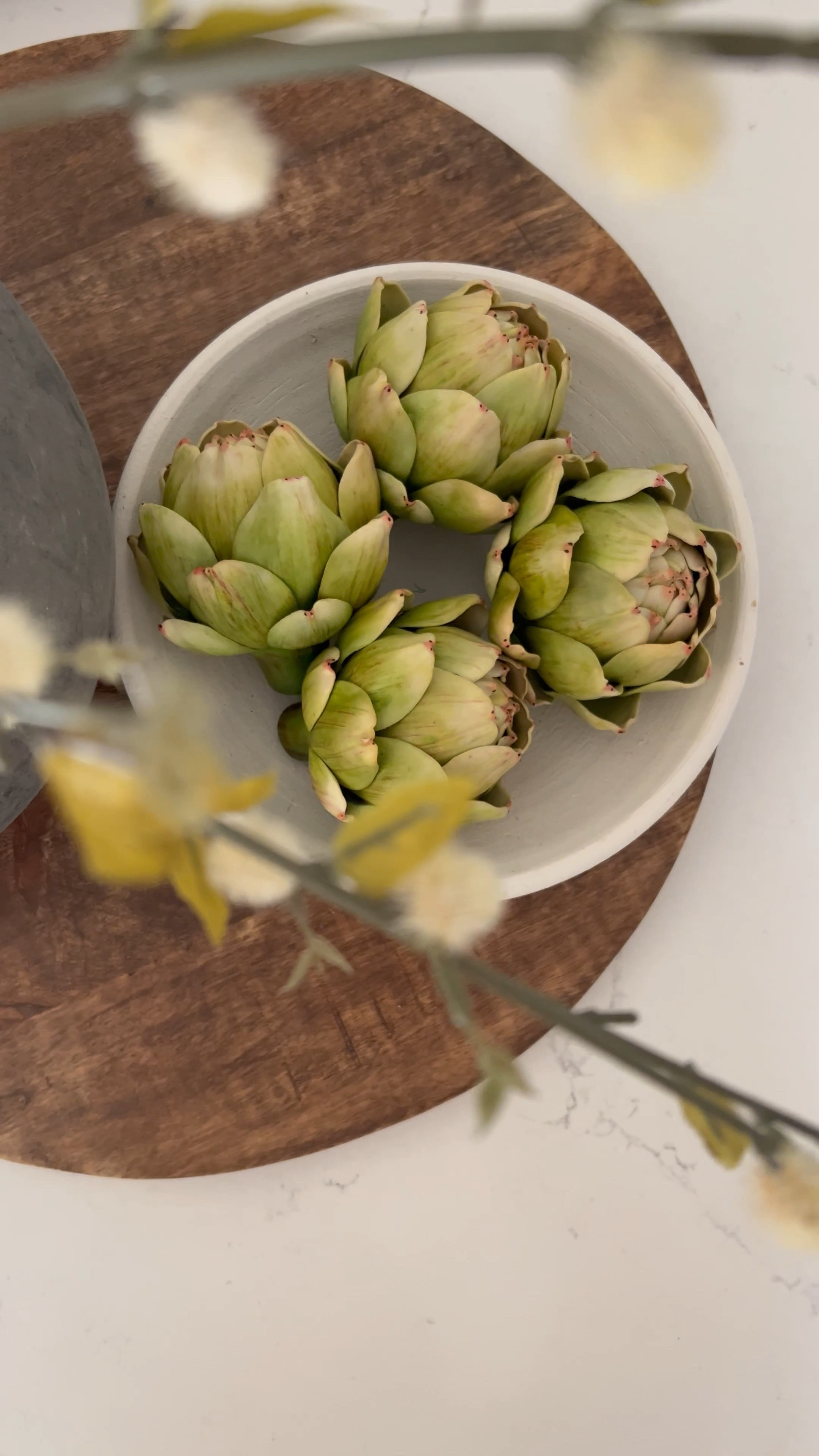 Spring Kitchen Decor | kitchen island decor | round wood pedestal board | round serving board | faux artichokes | pussywill stems | spring stems | faux branch with buds | spring flowers | Amazon 

#LTKunder100 #LTKhome #LTKstyletip