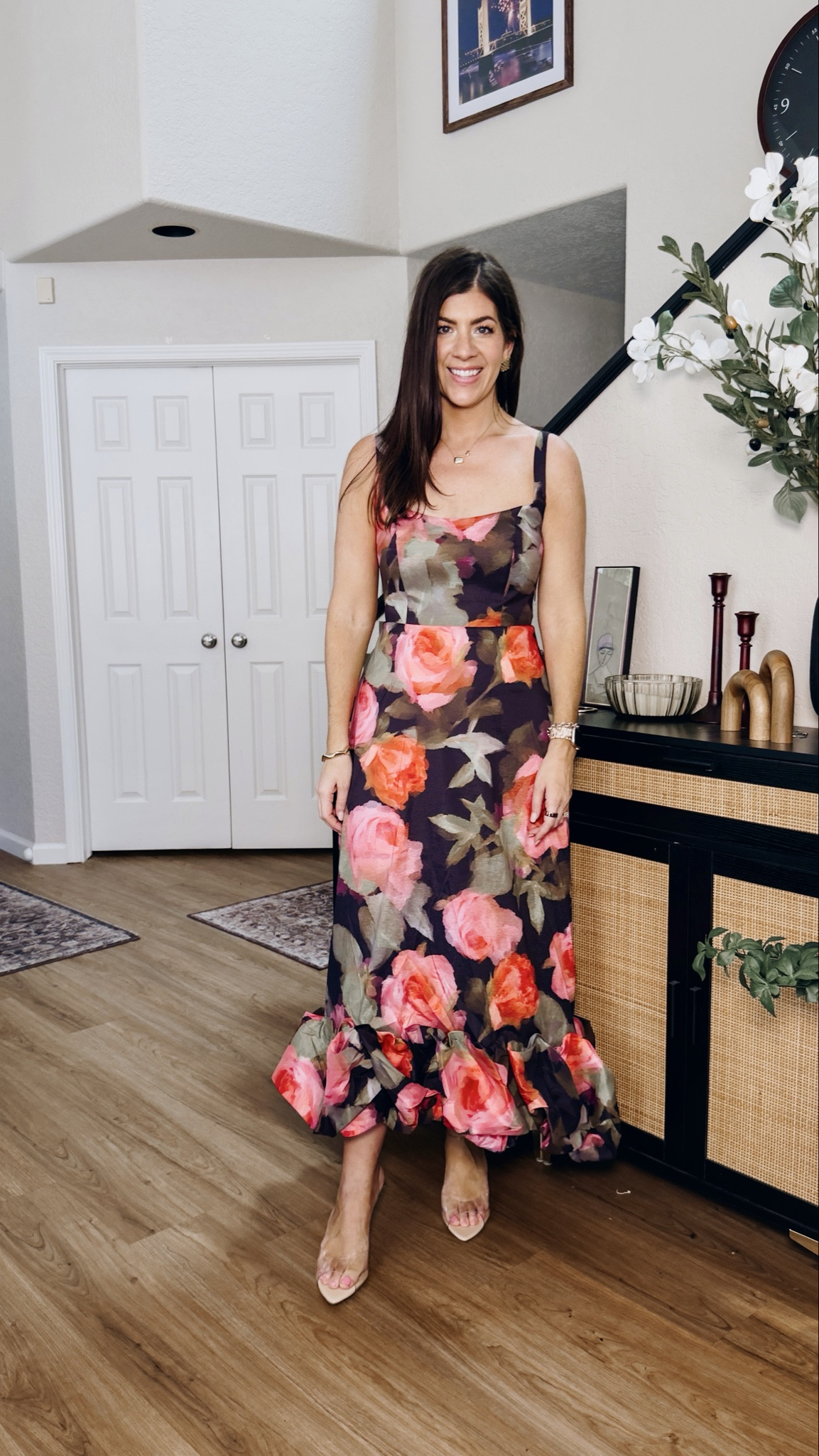 In a medium floral ruffle bottom dress 
Code MEGANH20

#LTKWedding #LTKMidsize #LTKTall