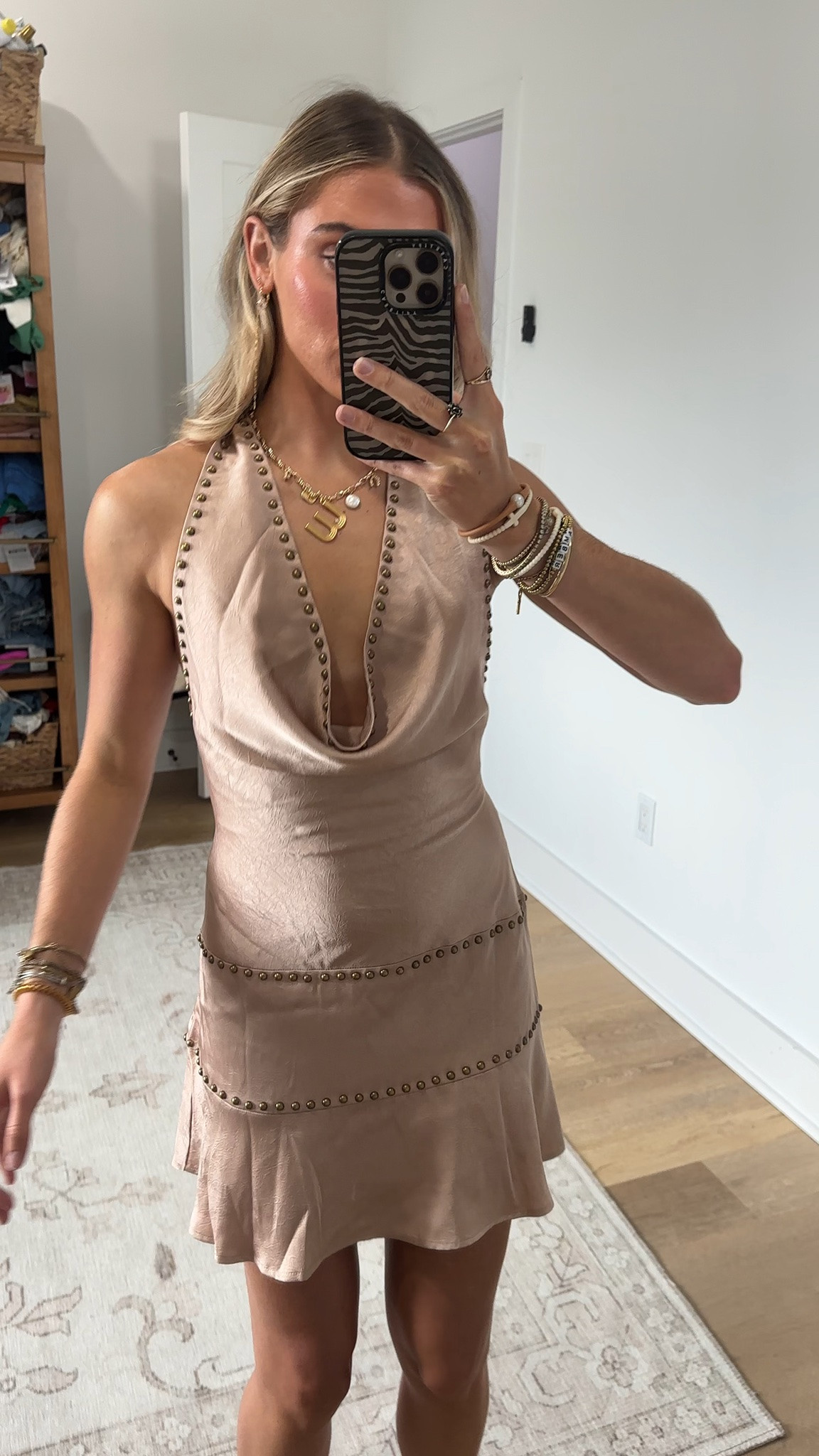 @12th Tribe size xs code is SLOANEFES10. Outlaw looks, no alibi in the Jolene Champagne Studded Mini Dress. Sheesh did we outdo ourselves with this beauty? Pop the champagne with this studded, deep cowl neckline, drop waist, low back mini dress. The only thing better than the line-up is looking so good dancing in this one and done piece.

#LTKootd #LTKSaleAlert #LTKSeasonal