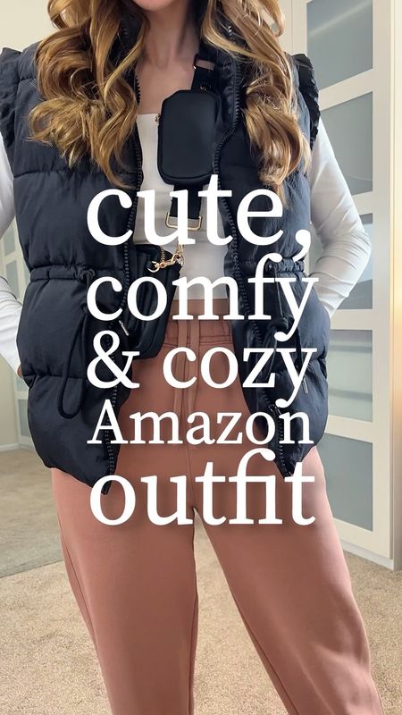 Cute, comfy, and cozy aka the best combo 🙌🏻
I’m wearing a size medium in the black vest. I’m wearing a size extra small in the sweatpants. Sneakers fit TTS.

Black vest outfit | dad sneakers | Amazon outfits | Amazon fashion finds | vest outfits | vest puffer | casual winter outfits |  casual sneakers | cozy outfits


#LTKVideo #LTKfindsunder50 #LTKSeasonal