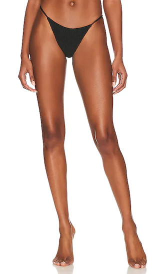 Olivia Smocked Bikini Bottom in Black | Revolve Clothing (Global)