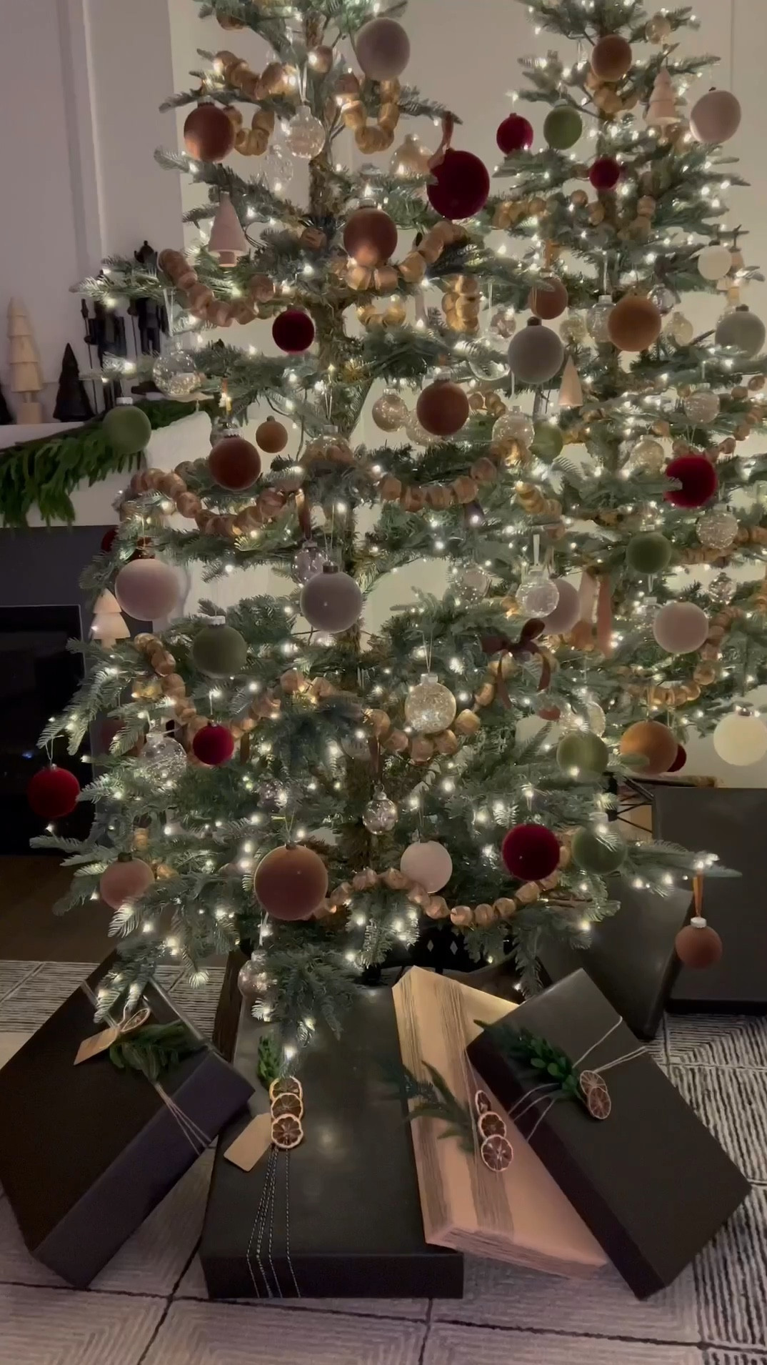 These gorgeous trees are from King of Christmas… The Christmas boxes are from Amazon 💕 I wrapped them with Kraft paper, twine, and added some dried oranges.  shop all these items below! 😊#LTKVideo #LTKHoliday

#LTKHome