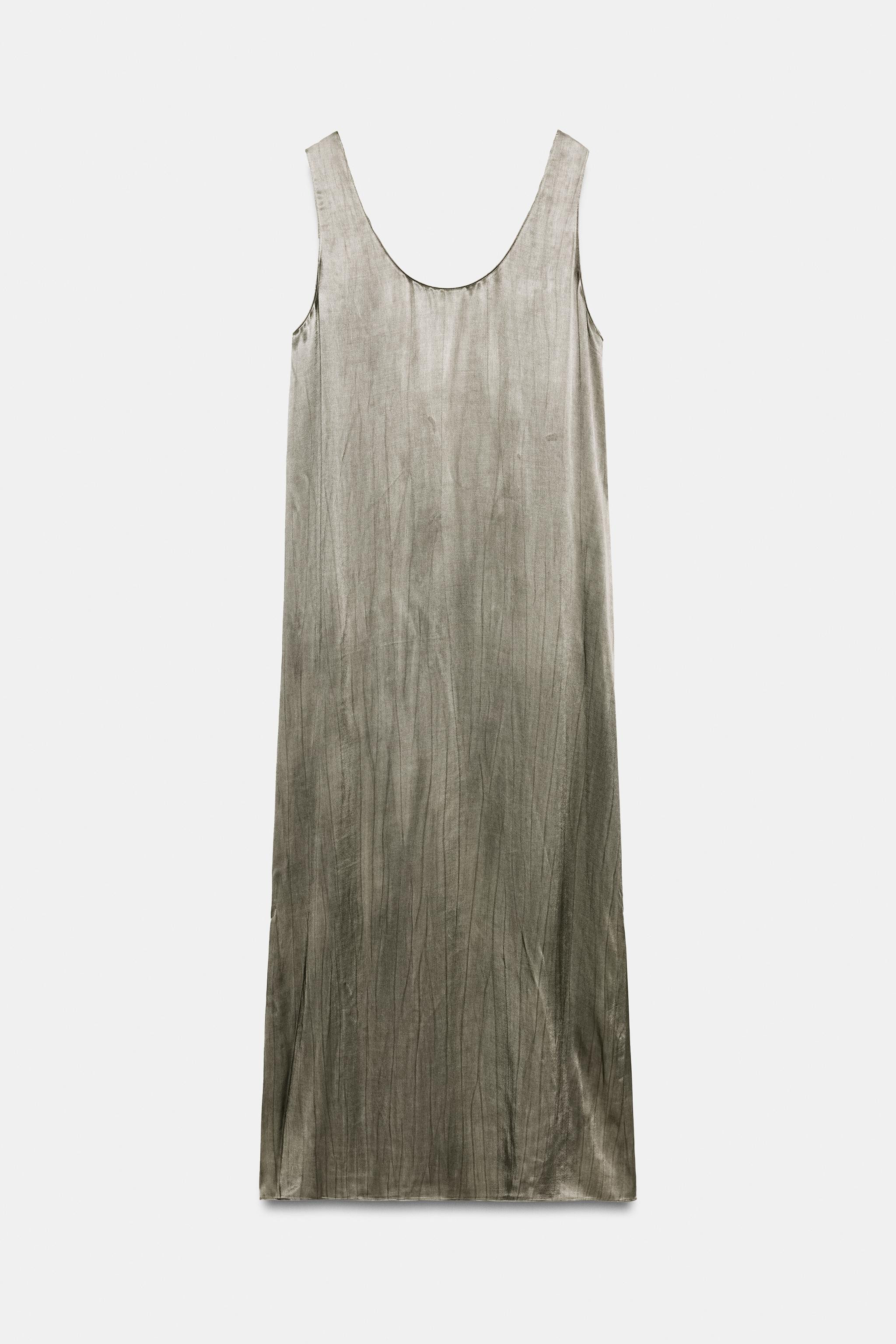 ZARA WOMAN COLLECTIONDress with main fabric made from viscose yarn. Round neckline and sleeveless... | Zara UK