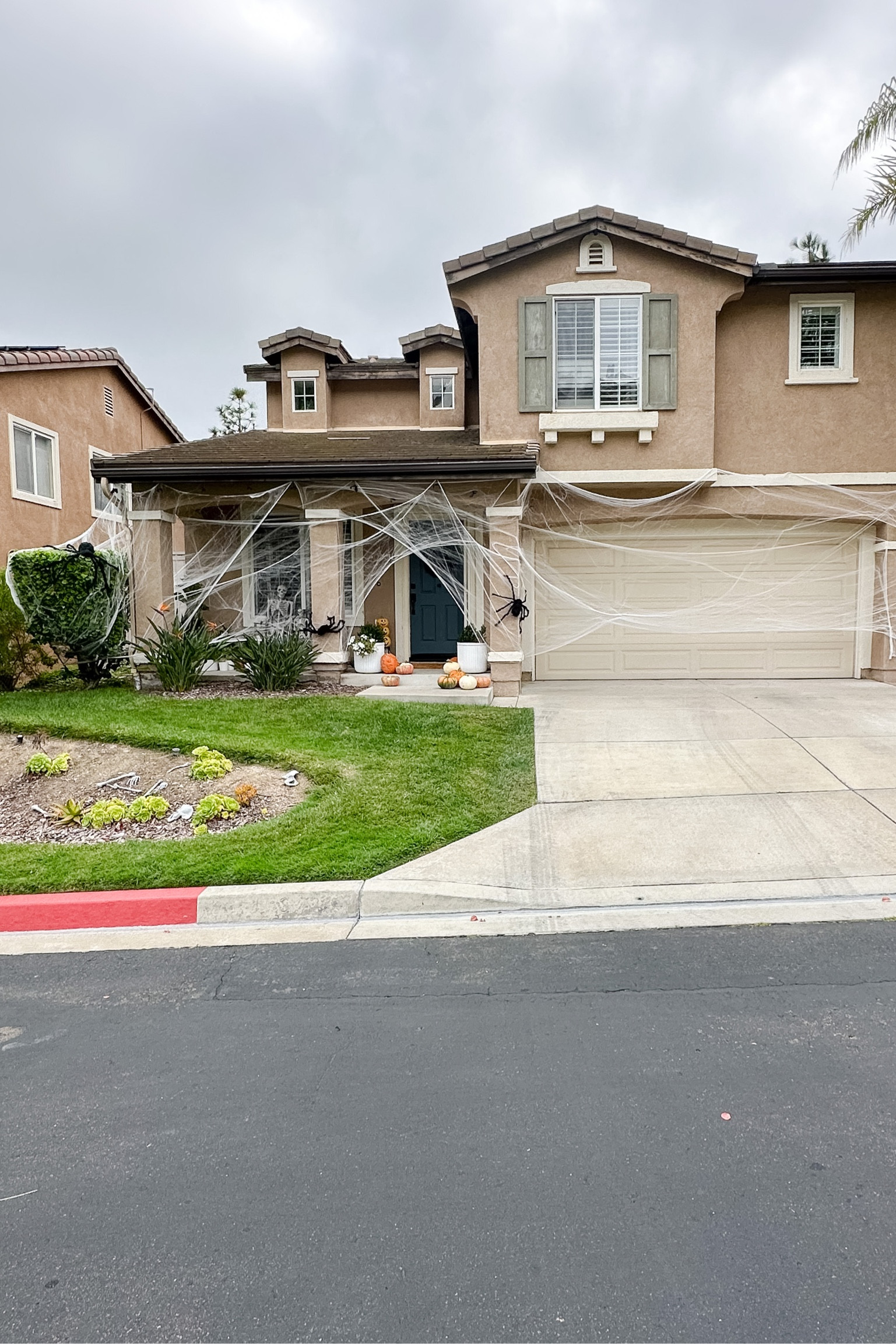 Halloween porch decor, large skeleton, spiderwebs, bats, large spiders, outdoor Halloween decor.

#LTKHalloween #LTKhome #LTKsalealert
