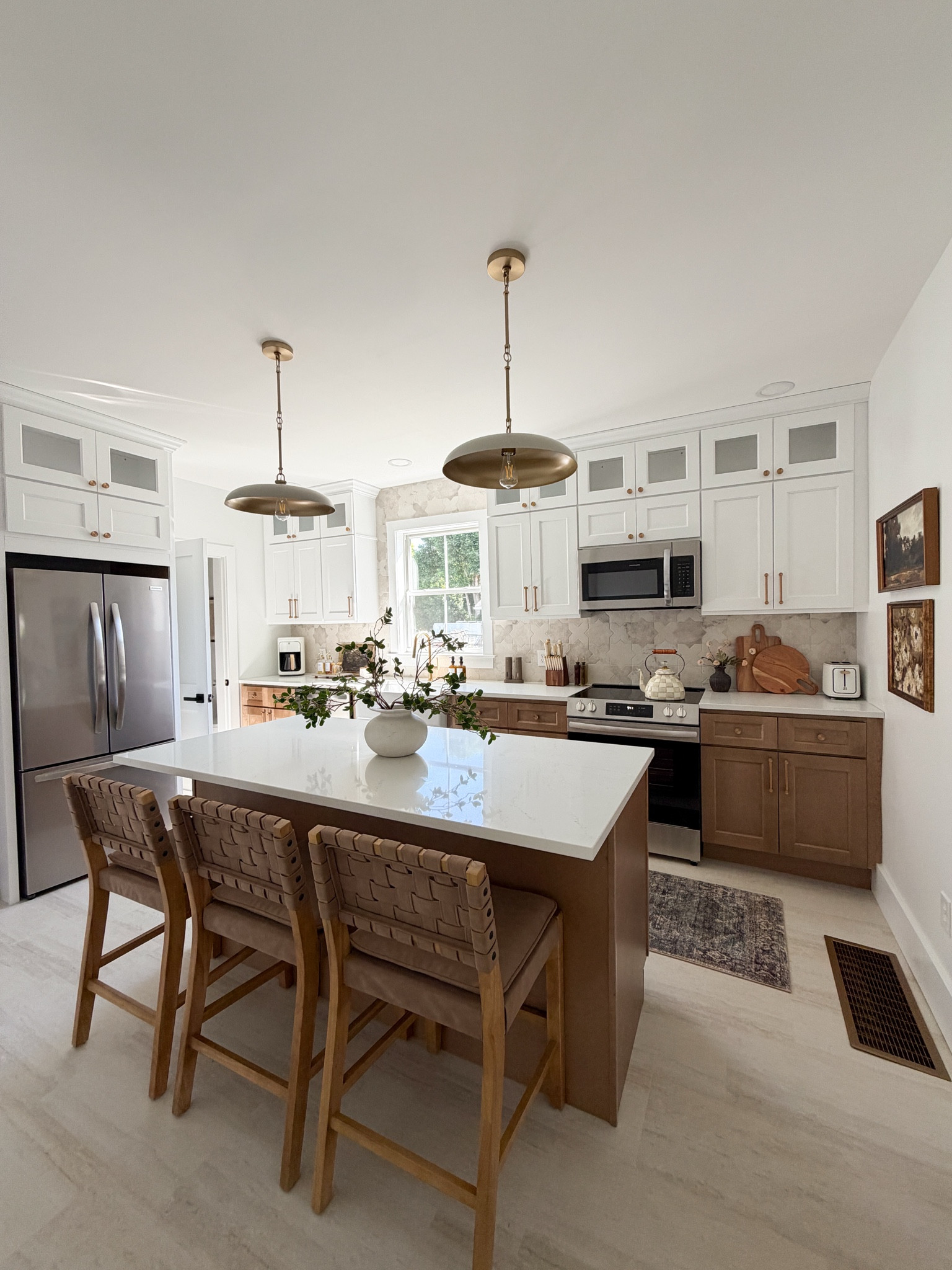 Welcome to our Airbnb kitchen! This was a full labor of love, as we started from the ground up. The cabinets are from RTA Cabinets — top is Weston White & bottom is Florence Honey. Everything else is linked here! 

#kitchenmakeover
#Airbnb