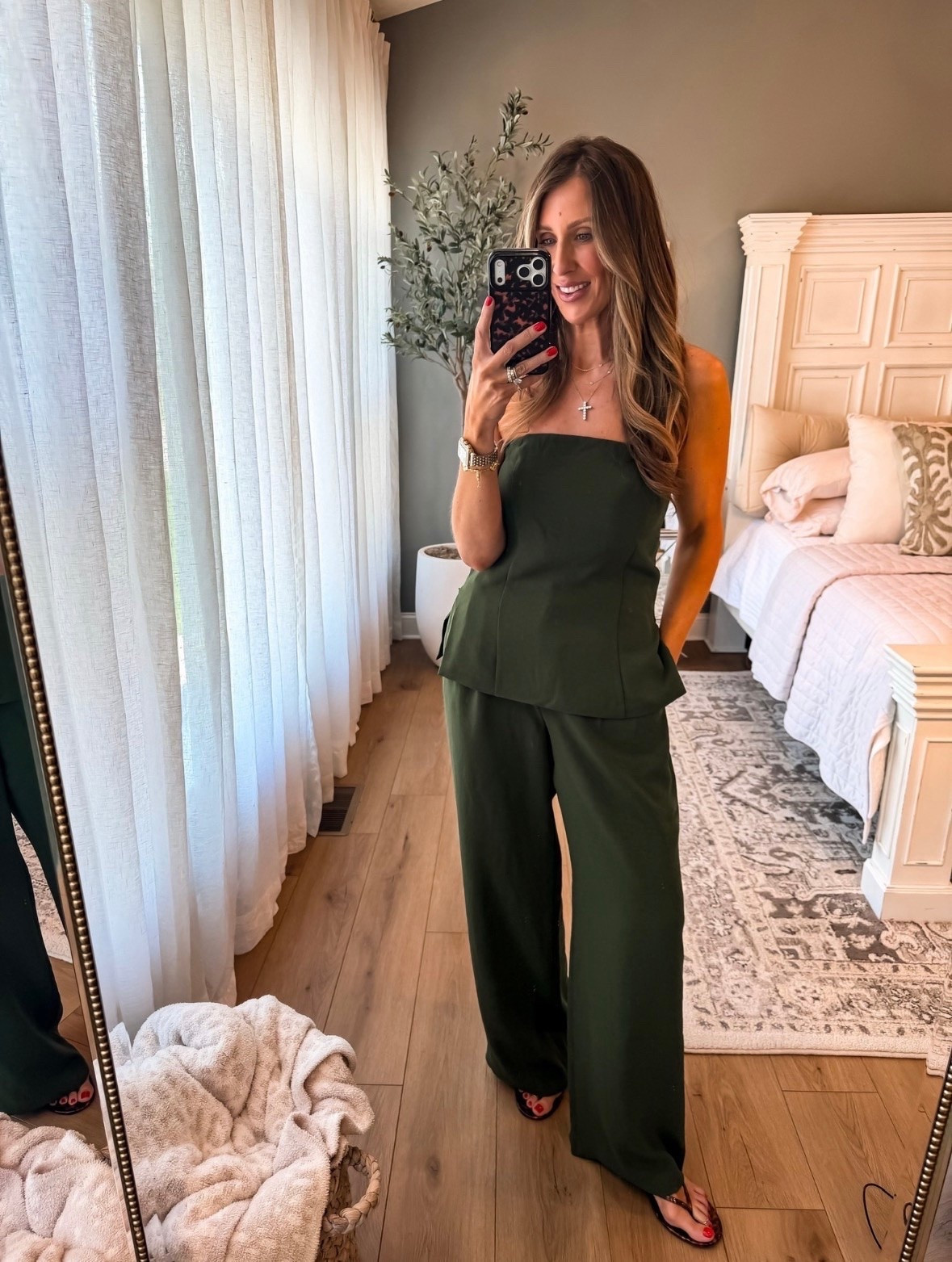 This matching set looks so elevated. The structured strapless top and wide leg pants create such a chic, elevated silhouette, and the deep olive color is perfect for summer into fall. A great option for date nights, vacations, or any event where you want to look polished with minimal effort.

olive matching set, strapless top, wide leg pants, elevated style, vacation outfit, date night look, summer fashion, chic outfit, resort wear, monochromatic outfit, effortless elegance, dressy casual style, themominstyle

#LTKootd #LTKOver40 #LTKSeasonal