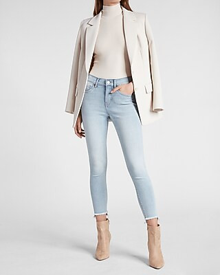 Mid Rise Light Wash Raw Hem Cropped Skinny Jeans | Express