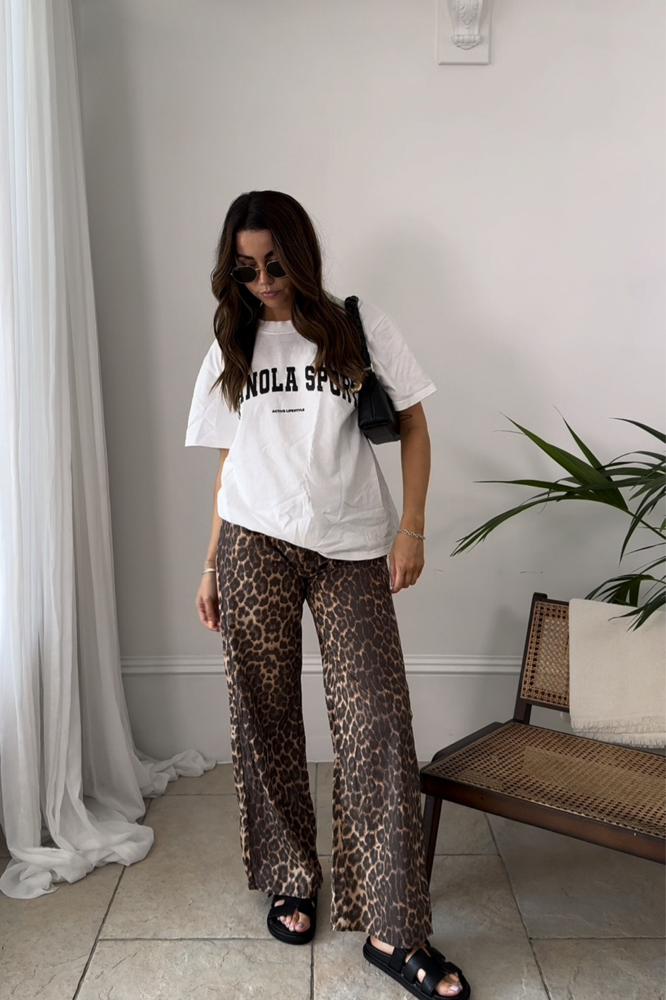 Styling the viral asos leopard print trousers with an adanola graphic T-shirt, octagonal rayban sunglasses and Hermes dupe sandals from ego

Summer style - summer fashion - leopard print outfit 

#LTKeurope #LTKstyletip #LTKsummer