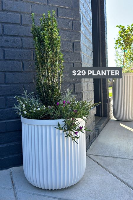 $29 white fluted planter from @walmart! Probably my favorite outdoor find this year- classic style, amazing quality, and looks great anywhere outside! We have 5 around our home & I love them! #walmartpartner #walmarthome 

#LTKFindsUnder50 #LTKStyleTip #LTKHome