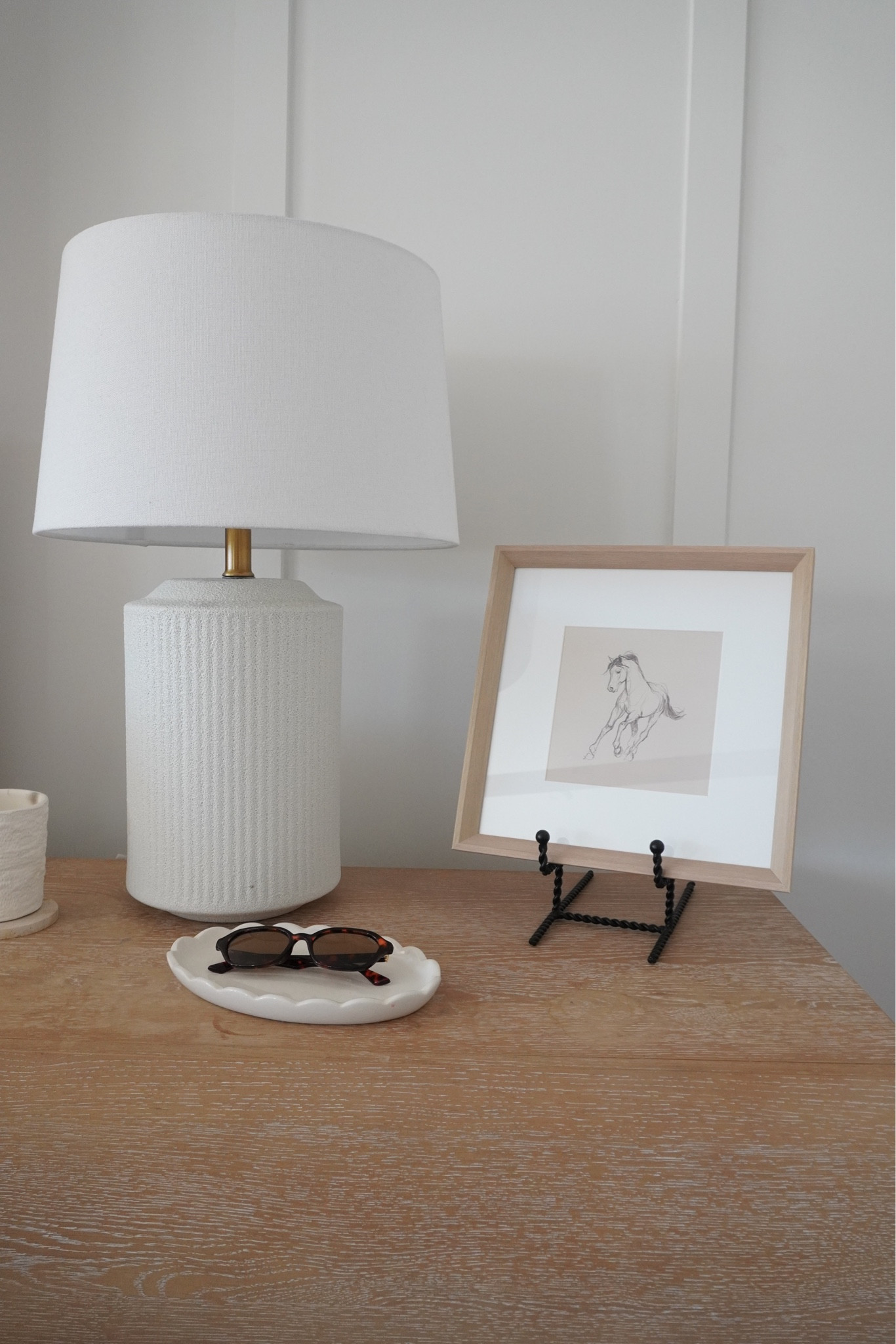 Added some settle, neutral decor to my bedside table. The framed art and the fluted lamp keep it neutral, but add detail.

#LTKmomlife #LTKdayinmylife #LTKHome