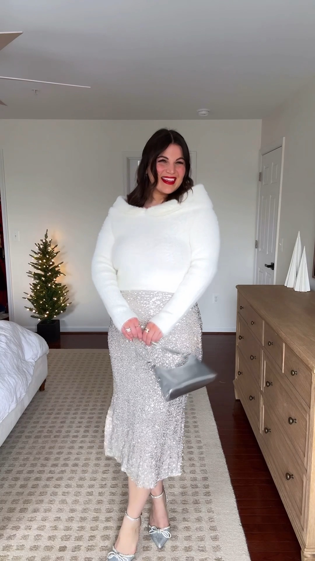 Midsize holiday outfit! You went crazy for this sequin skirt in black so naturally I had to grab the silver as well! And it’s just as good!! 😍 styled it with this white fluffy sweater + some silver accesssories to go with the skirt! You can shop both at @shopbalticborn + use my code KELLY15 to save! 

Strapless -  xl *use code KELLYTK20 to save 
Sweater - xl
Skirt - xl
Heels - 9 
*similar bag



#LTKGiftGuide #LTKHoliday #LTKMidsize