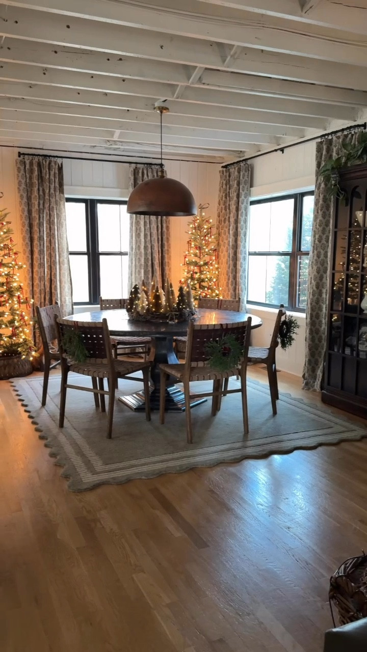 What do you think!? Going for more of a vintage charm vibe in here! 🥹❤️ These trees from target fit in the space so well & I love the fabric I found on Etsy! I linked a similar tree on Amazon since mine are low stock! I originally ordered the fabric for the living room but thought it would look so beautiful in the dining room with the new rug we received from @chrislovesjulia new collection with Loloi! #christmasdining #holidaydining #LTKVideo

#LTKHome #LTKHoliday